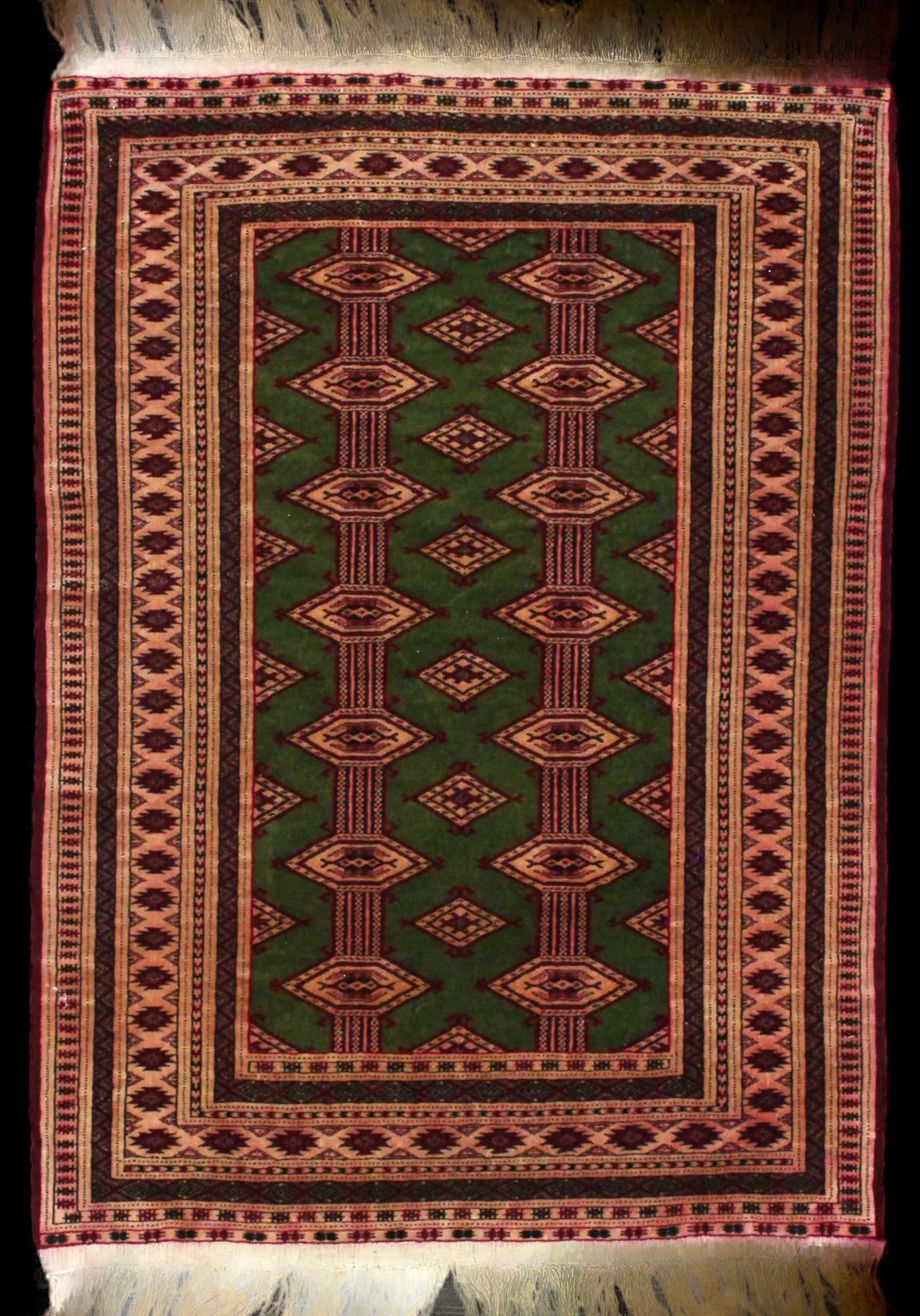 Handmade Persian rug of Turkoman style in dimensions 135 centimeters length by 97 centimetres width with mainly Green colors