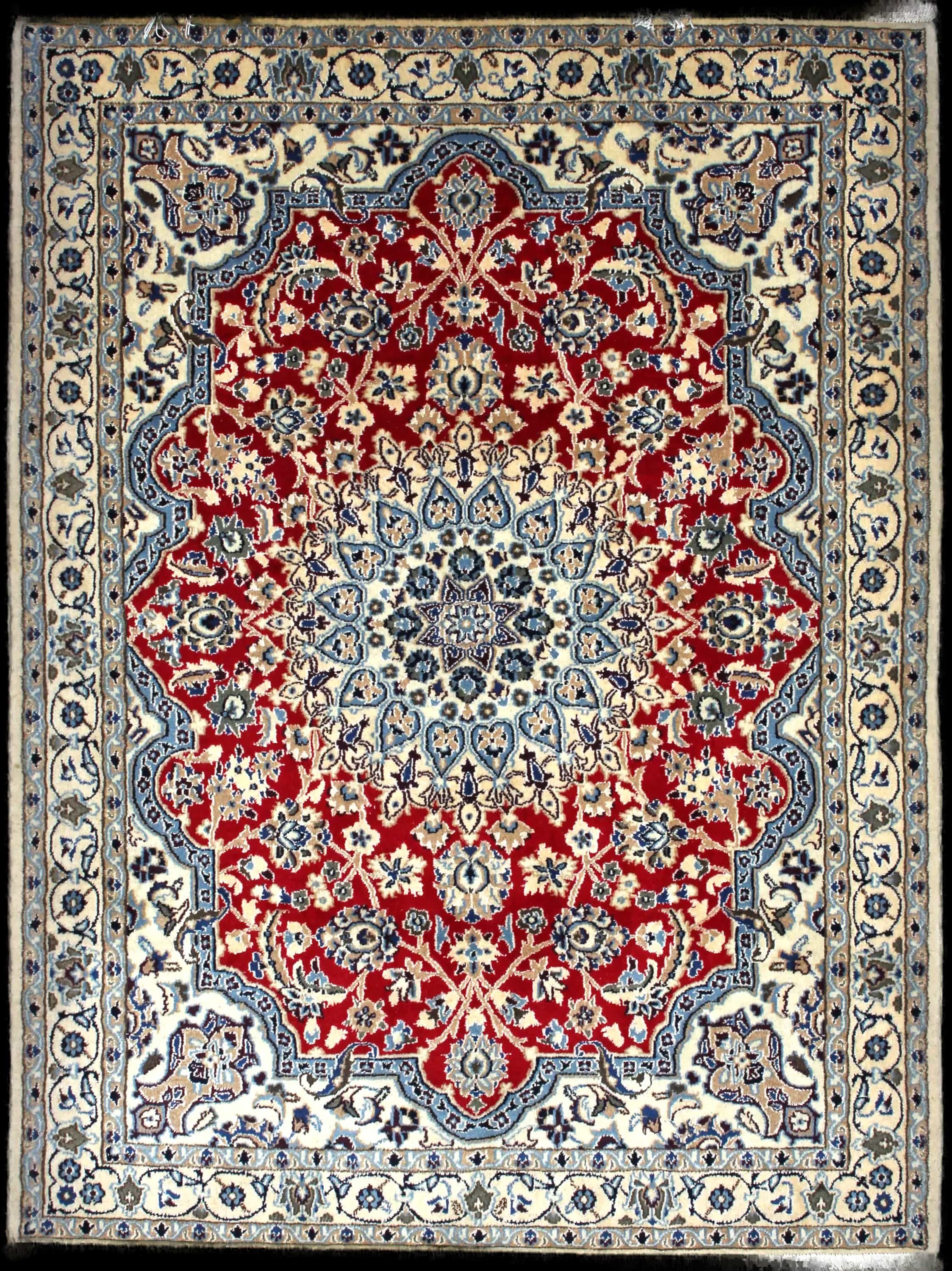 Handmade Perse rug in dimensions 196 centimeters length by 148 centimeters width with mainly Rouge et Bleu colors