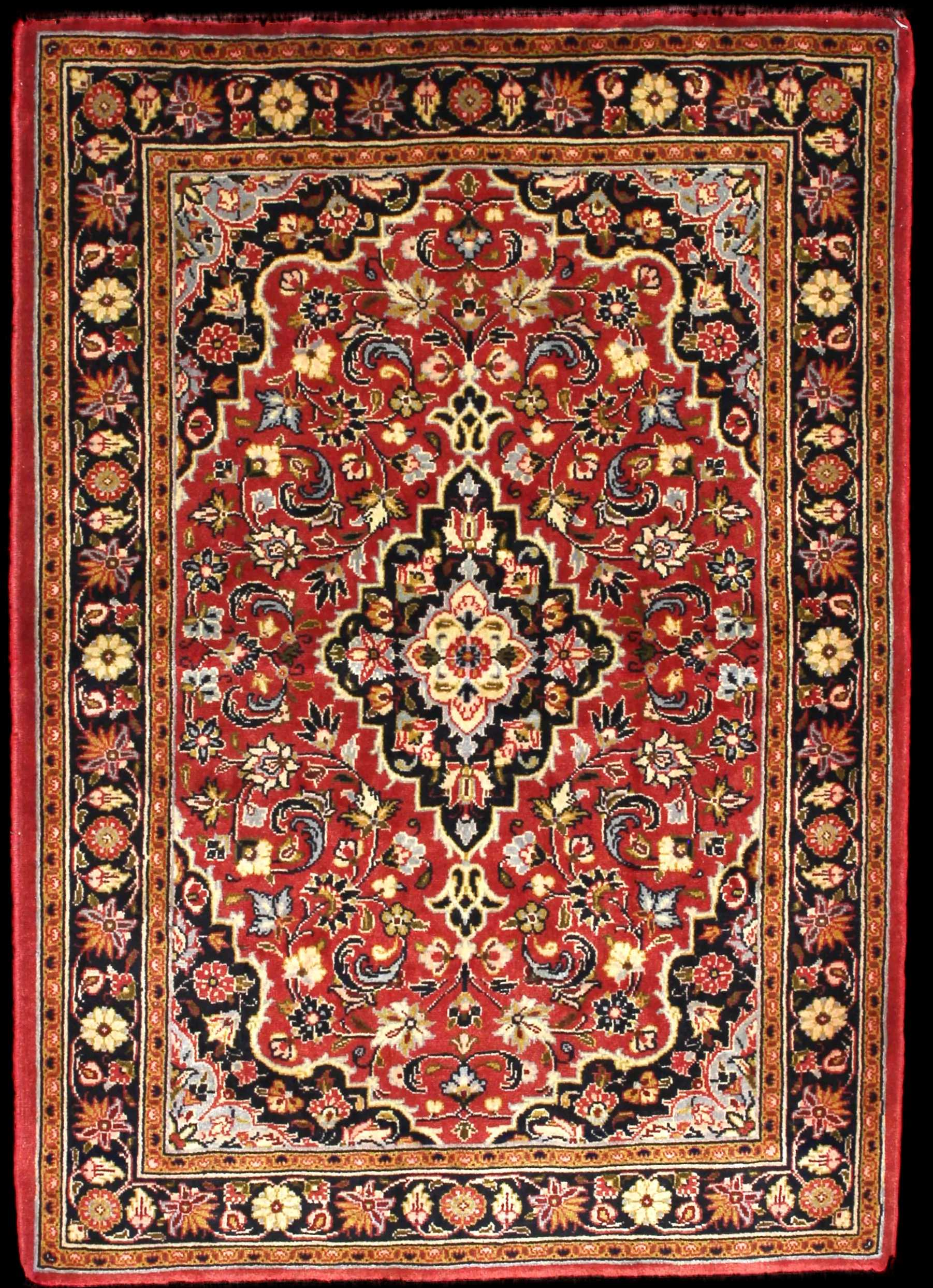 Handmade Perse rug in dimensions 146 centimeters length by 105 centimeters width with mainly Rouge colors