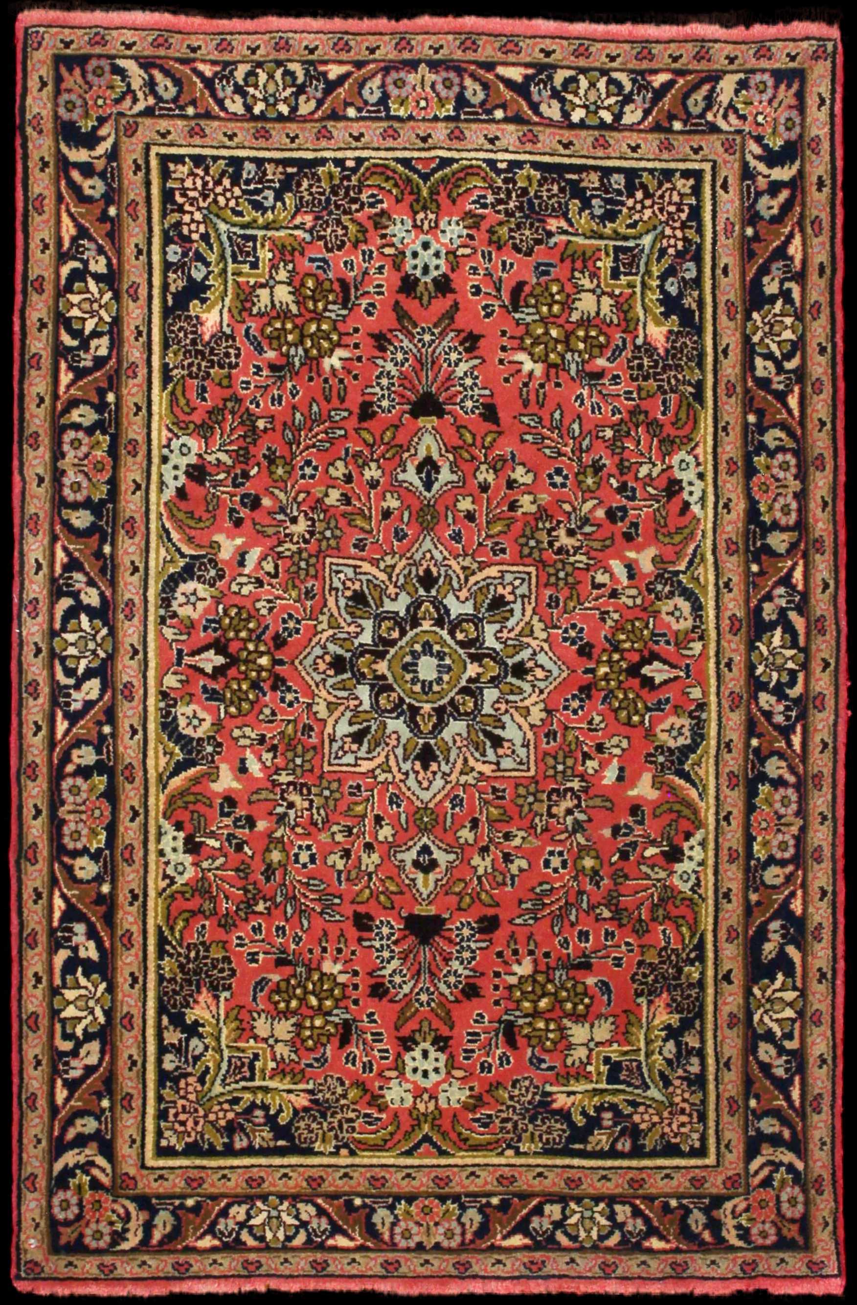 Handmade Perse rug in dimensions 150 centimeters length by 100 centimeters width with mainly Rose colors