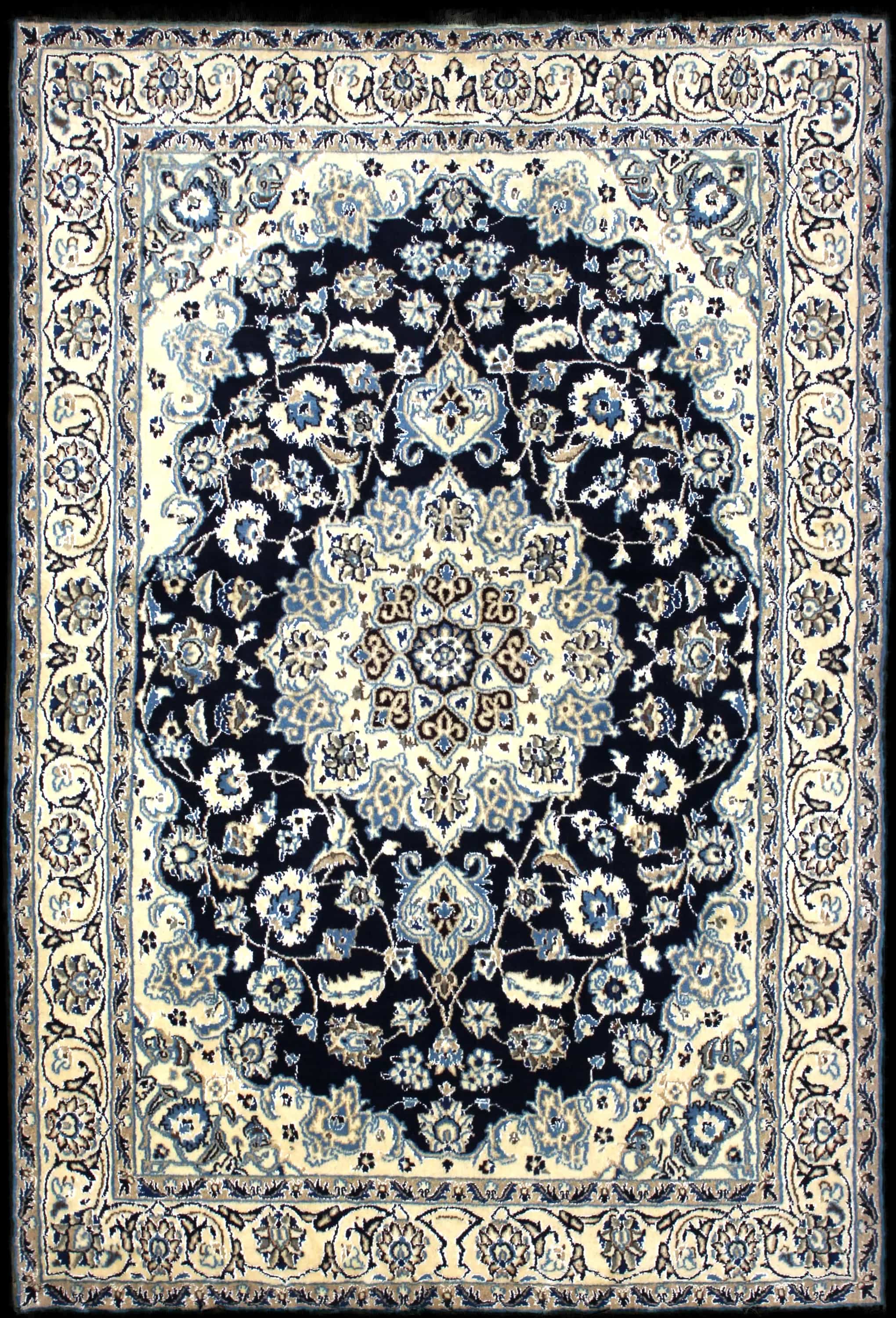 Handmade Persian rug in dimensions 209 centimeters length by 140 centimeters width with mainly Blue colors