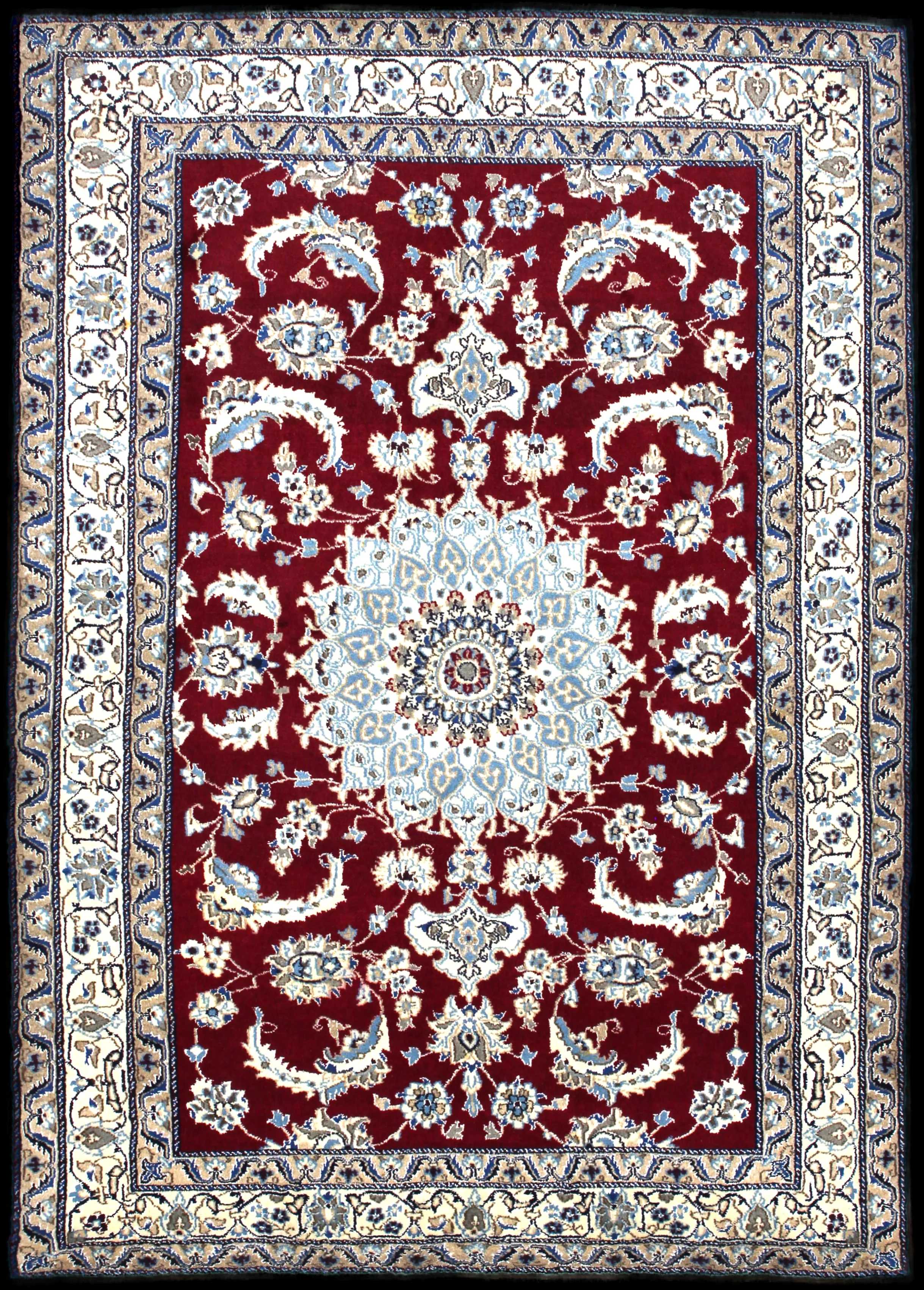 Handmade Persian rug of Nain style in dimensions 203 centimeters length by 145 centimetres width with mainly Red and Blue colors