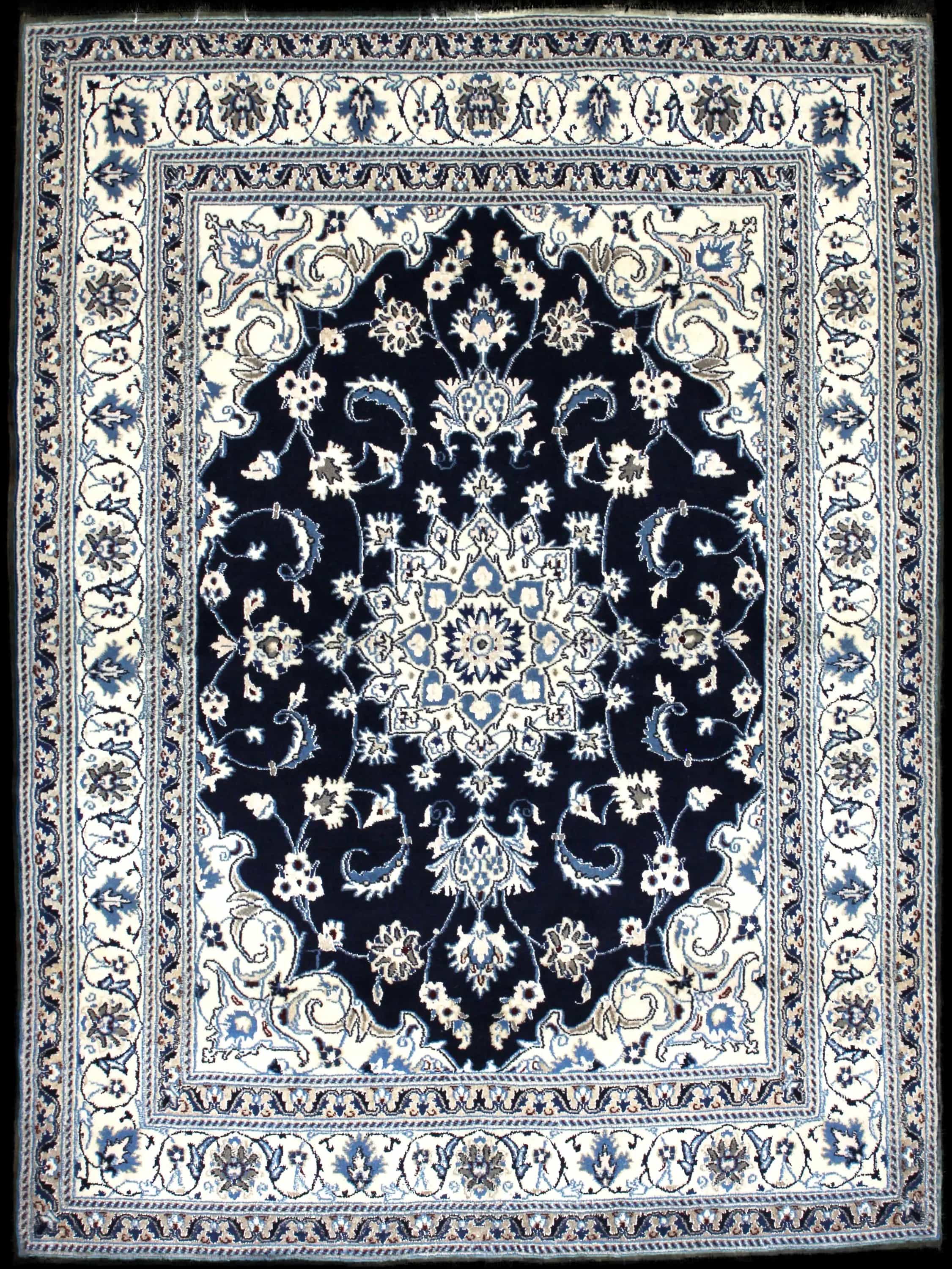 Handmade Persian rug in dimensions 204 centimeters length by 148 centimeters width with mainly Blue colors