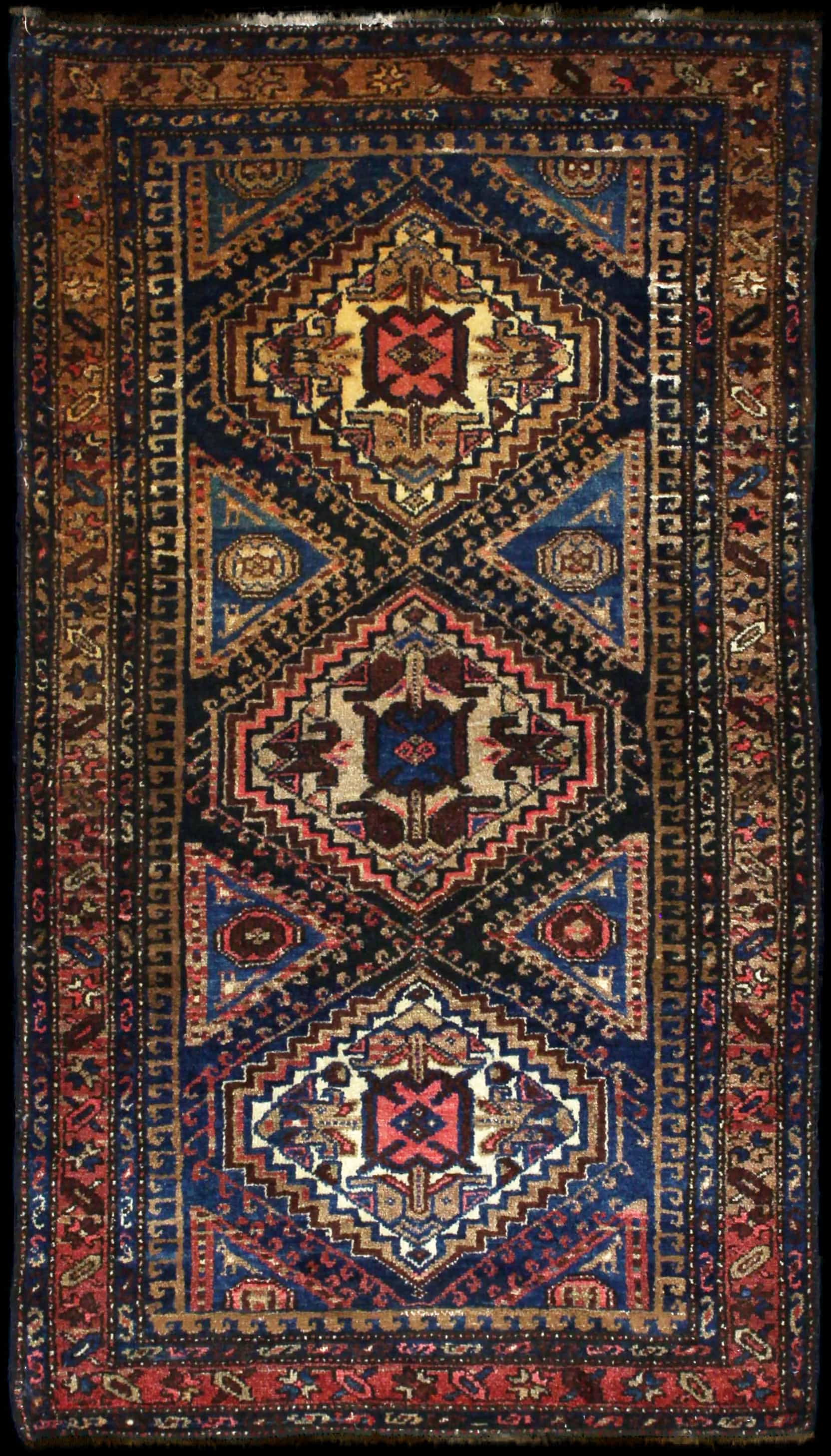 Handmade Perse rug in dimensions 170 centimeters length by 97 centimeters width with mainly Bleu et Rose colors