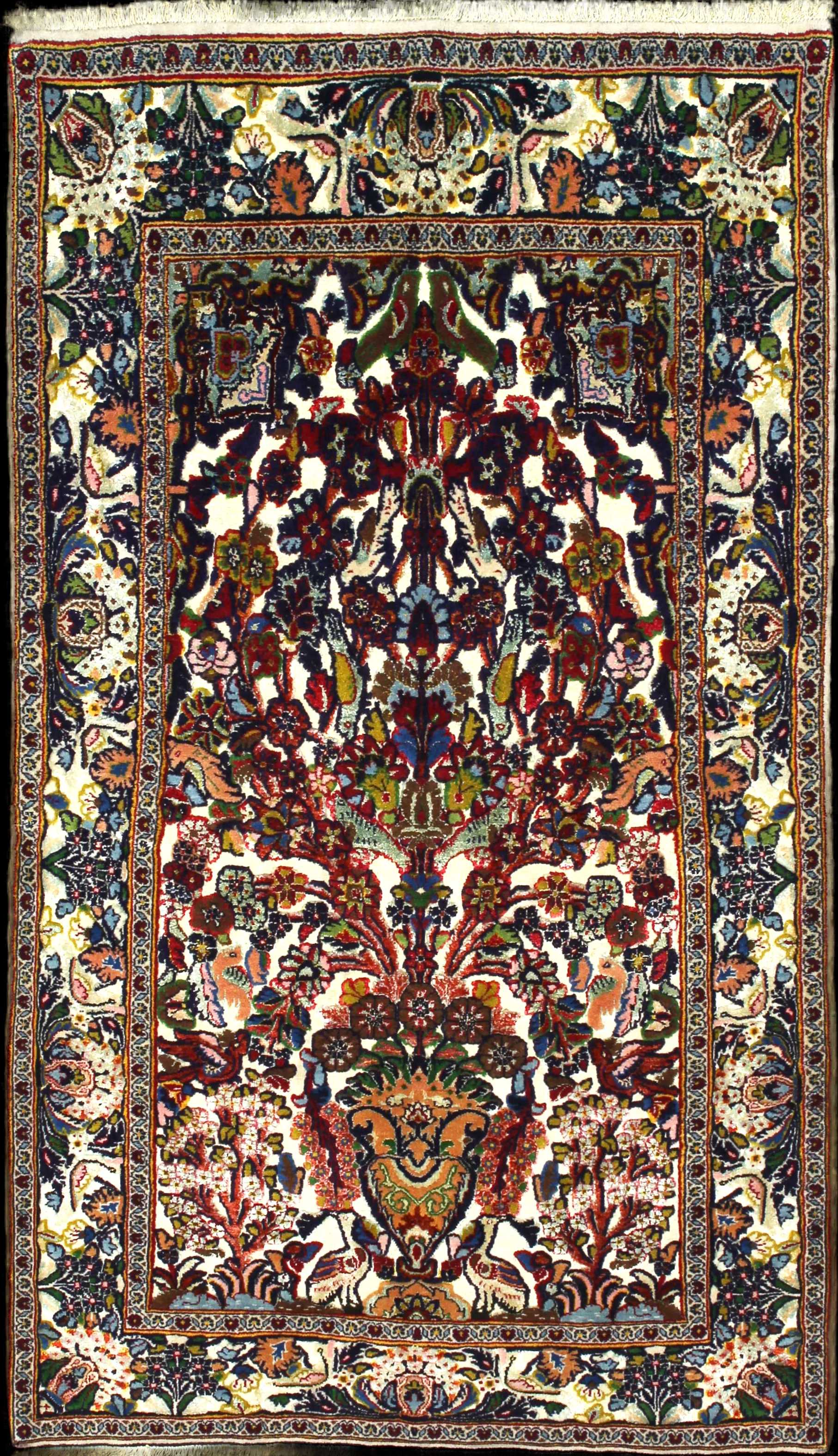 Handmade Persian rug in dimensions 180 centimeters length by 103 centimetres width with mainly Red and Orange colors