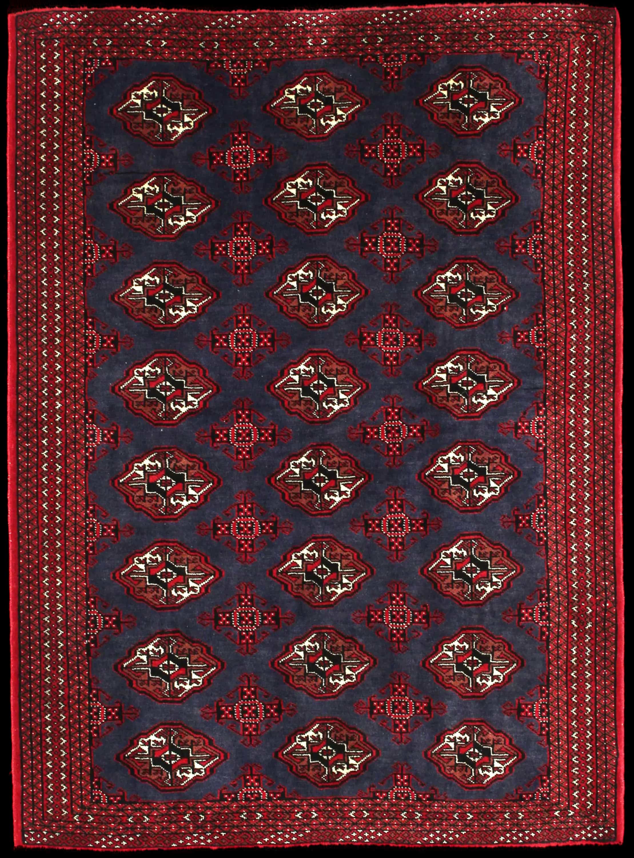 Handmade Perse rug in dimensions 179 centimeters length by 130 centimeters width with mainly Rouge et Bleu colors