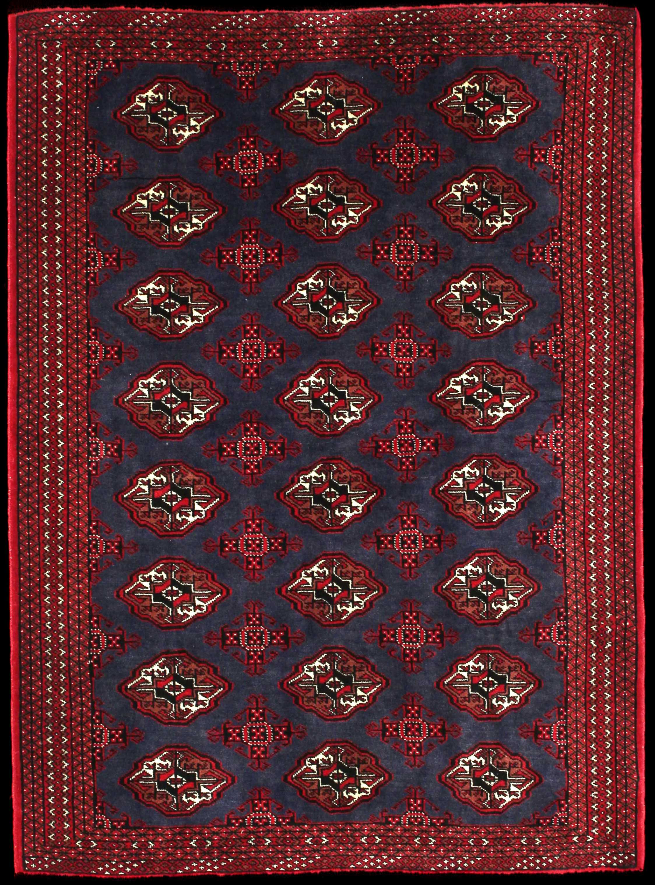 Handmade Persian rug of Turkoman style in dimensions 179 centimeters length by 130 centimetres width with mainly Red and Blue colors