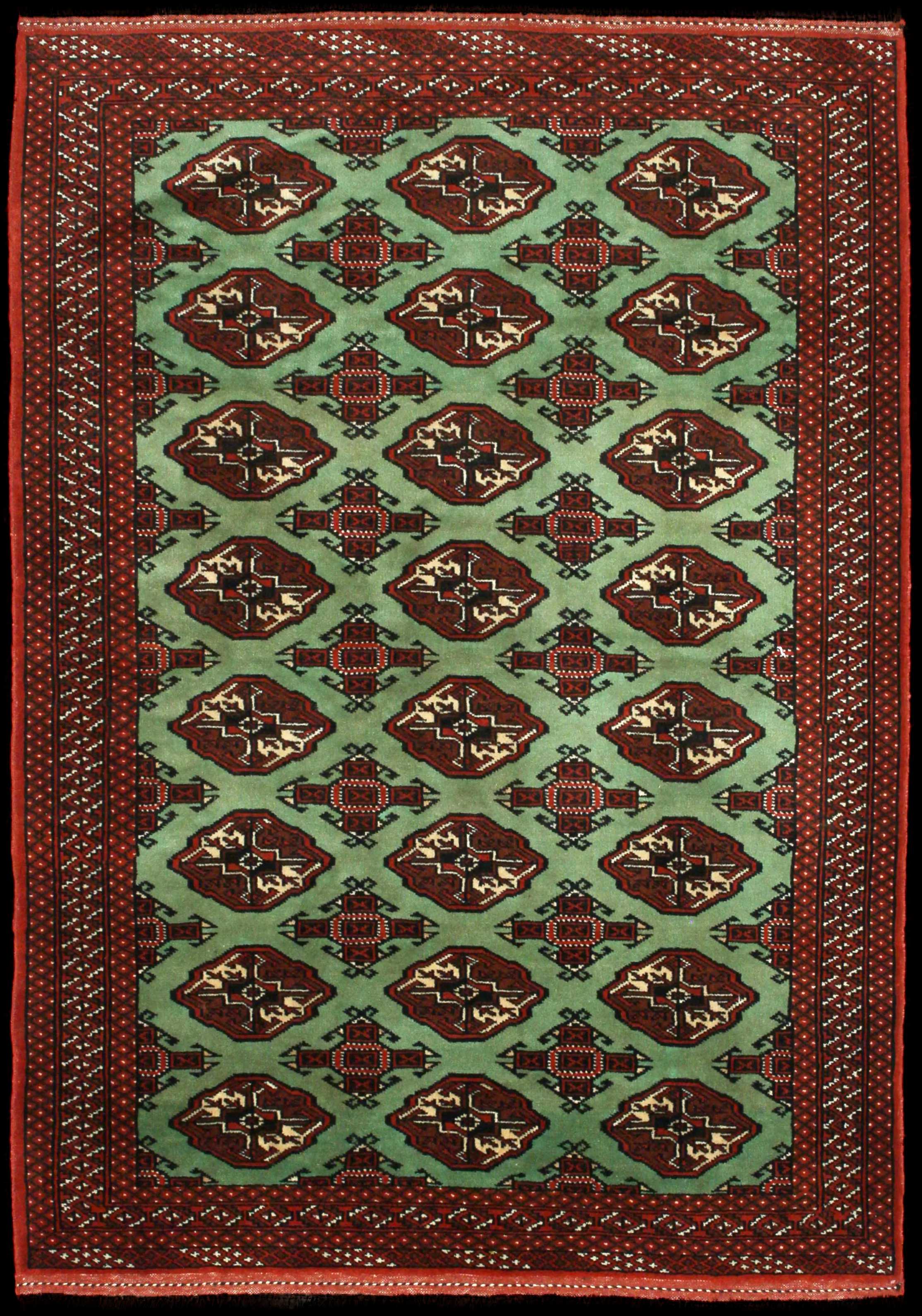 Handmade Persian rug of Turkoman style in dimensions 188 centimeters length by 130 centimetres width with mainly Green and Brown colors