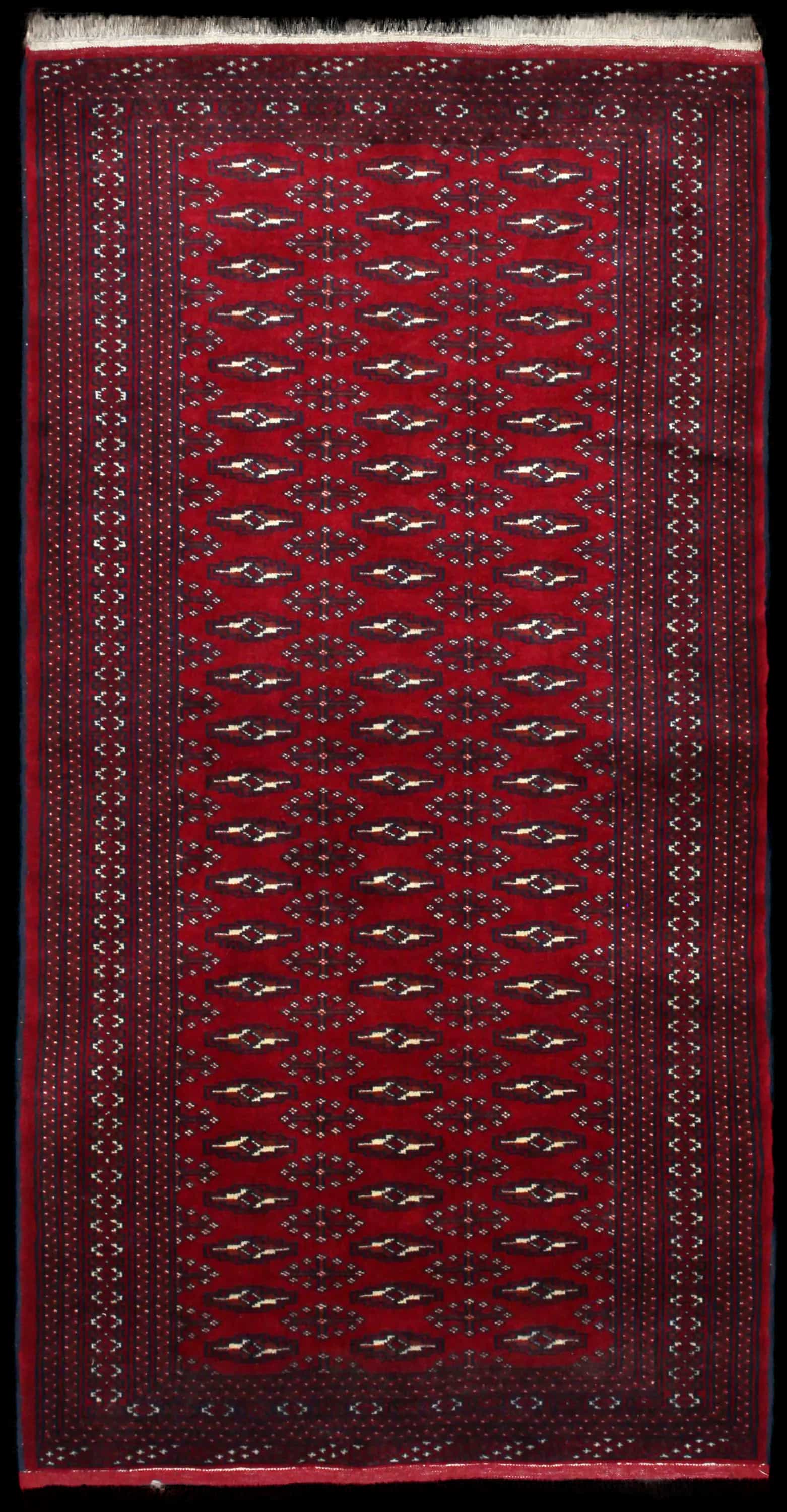 Handmade Persian rug in dimensions 200 centimeters length by 102 centimeters width with mainly Red colors