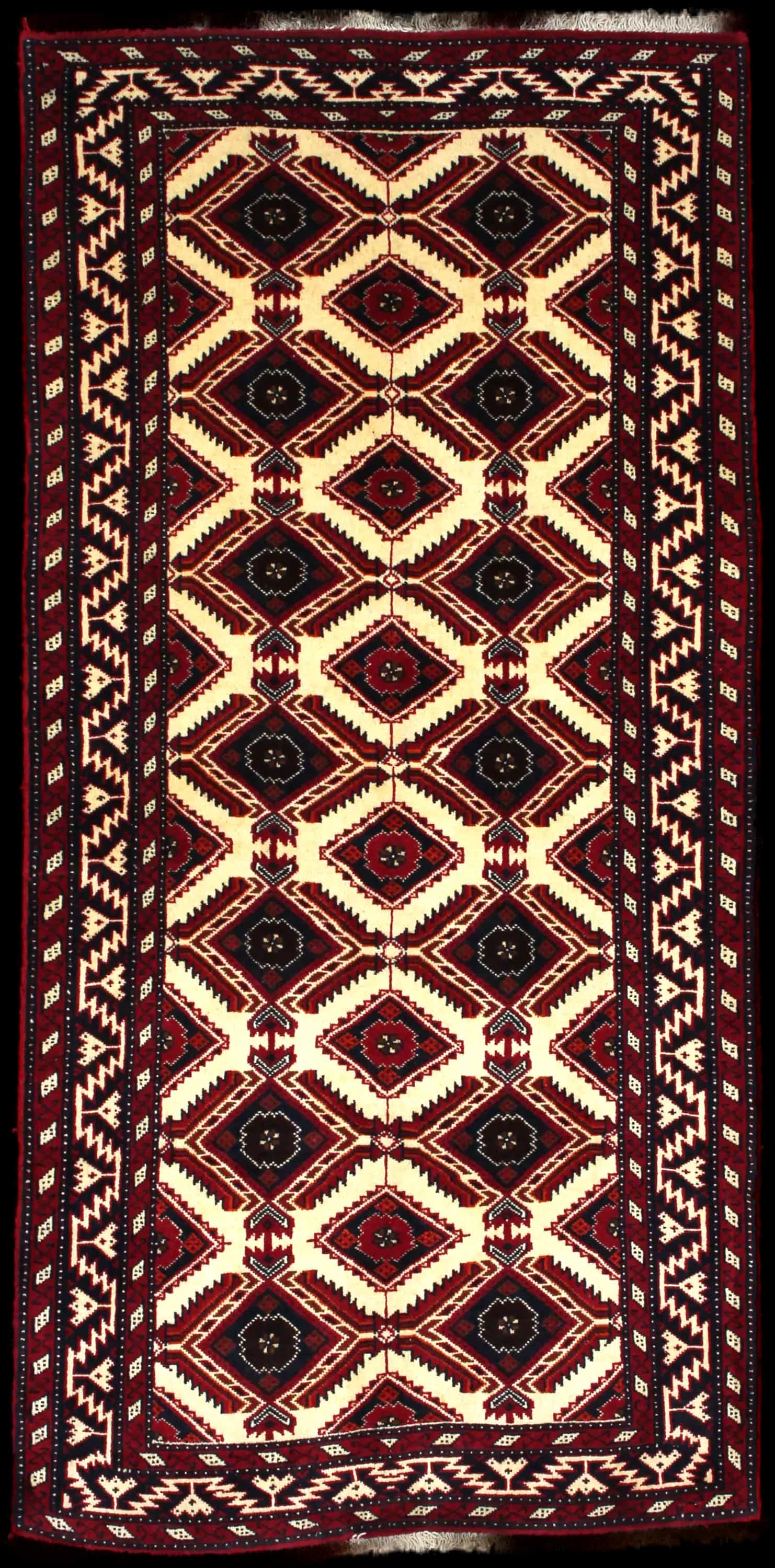 Handmade Perse rug in dimensions 196 centimeters length by 96 centimeters width with mainly Beige et Rouge colors