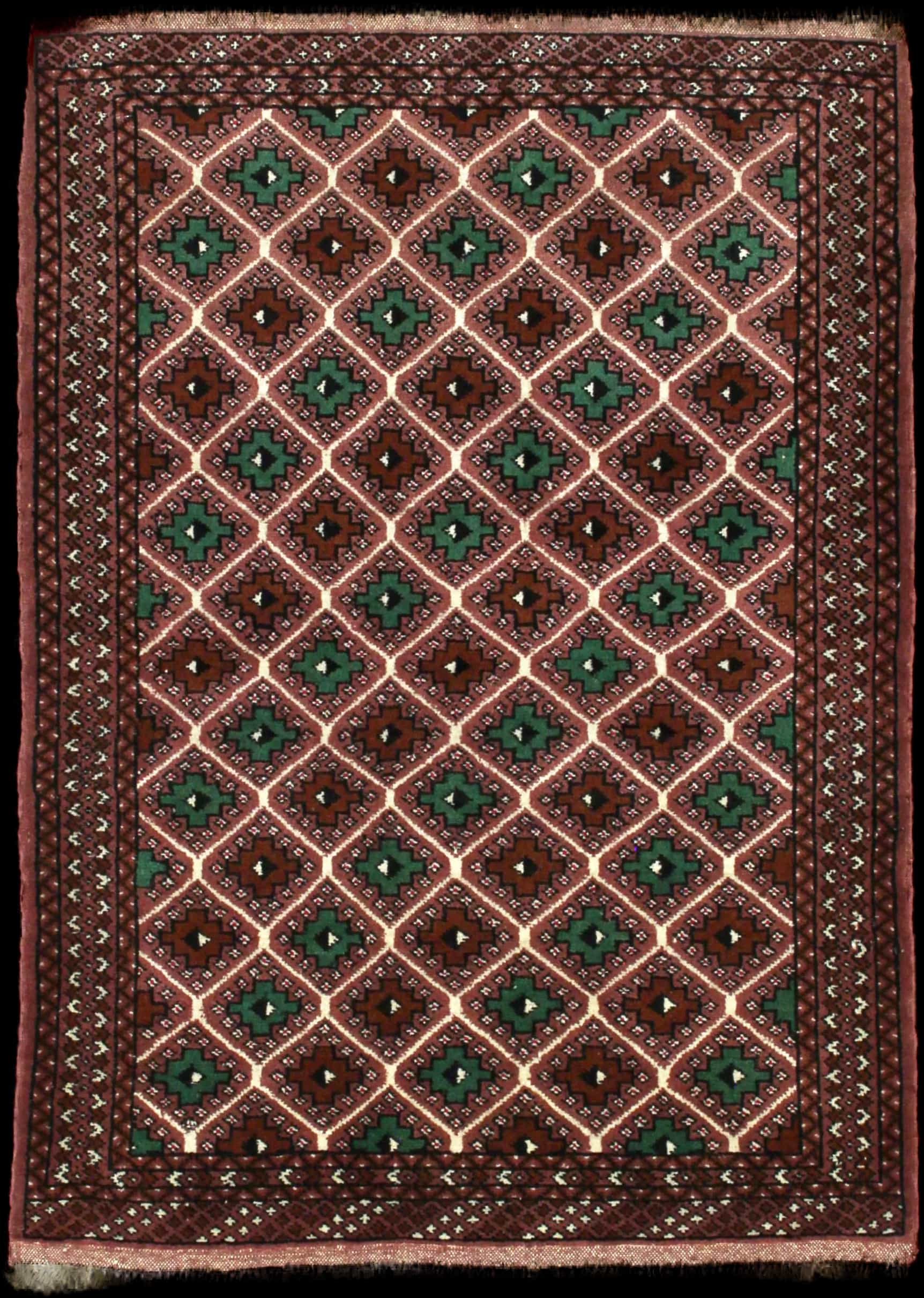 Handmade Perse rug in dimensions 140 centimeters length by 100 centimeters width with mainly Marron et Vert colors