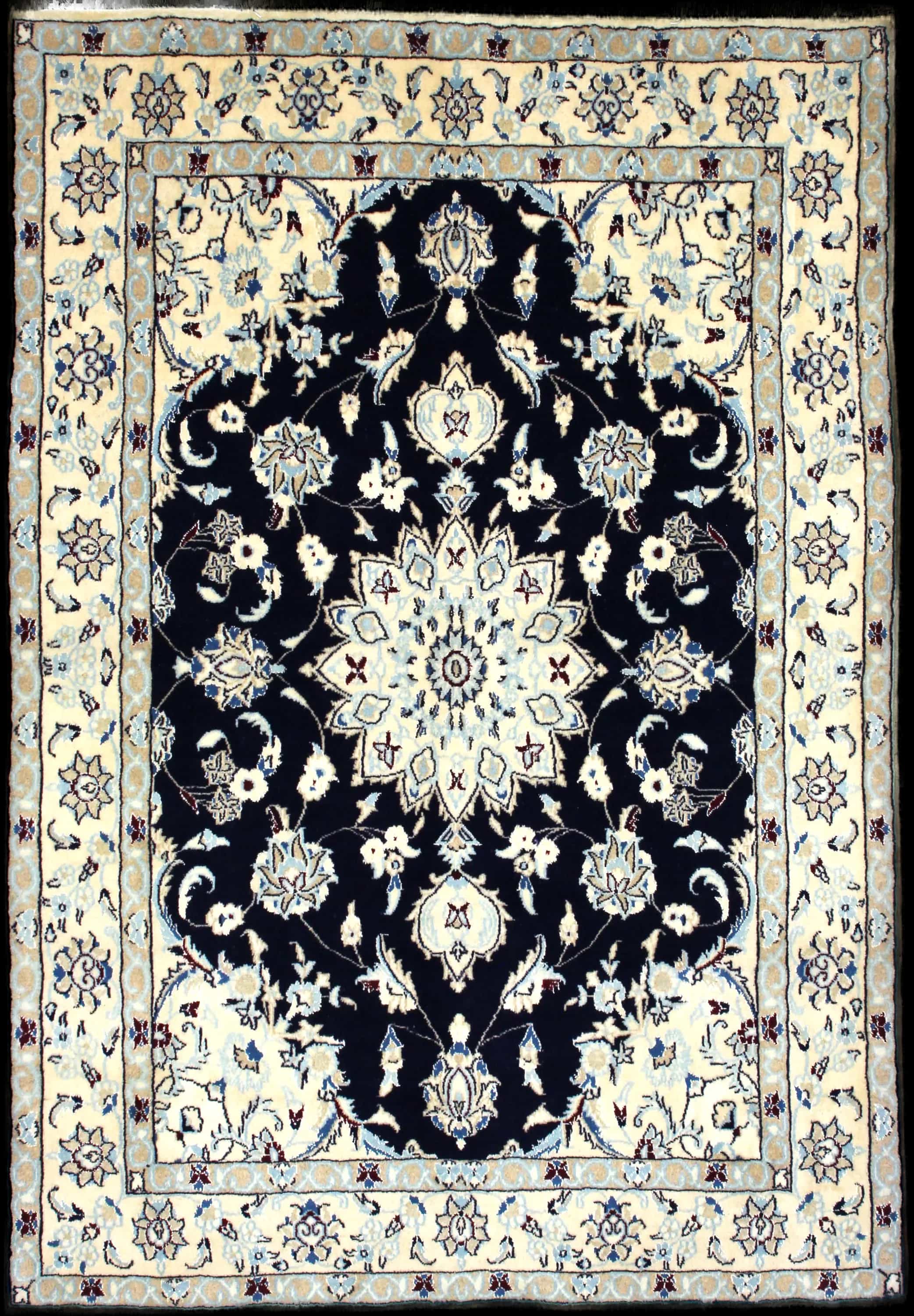 Handmade Perse rug in dimensions 214 centimeters length by 148 centimeters width with mainly Beige et Bleu colors