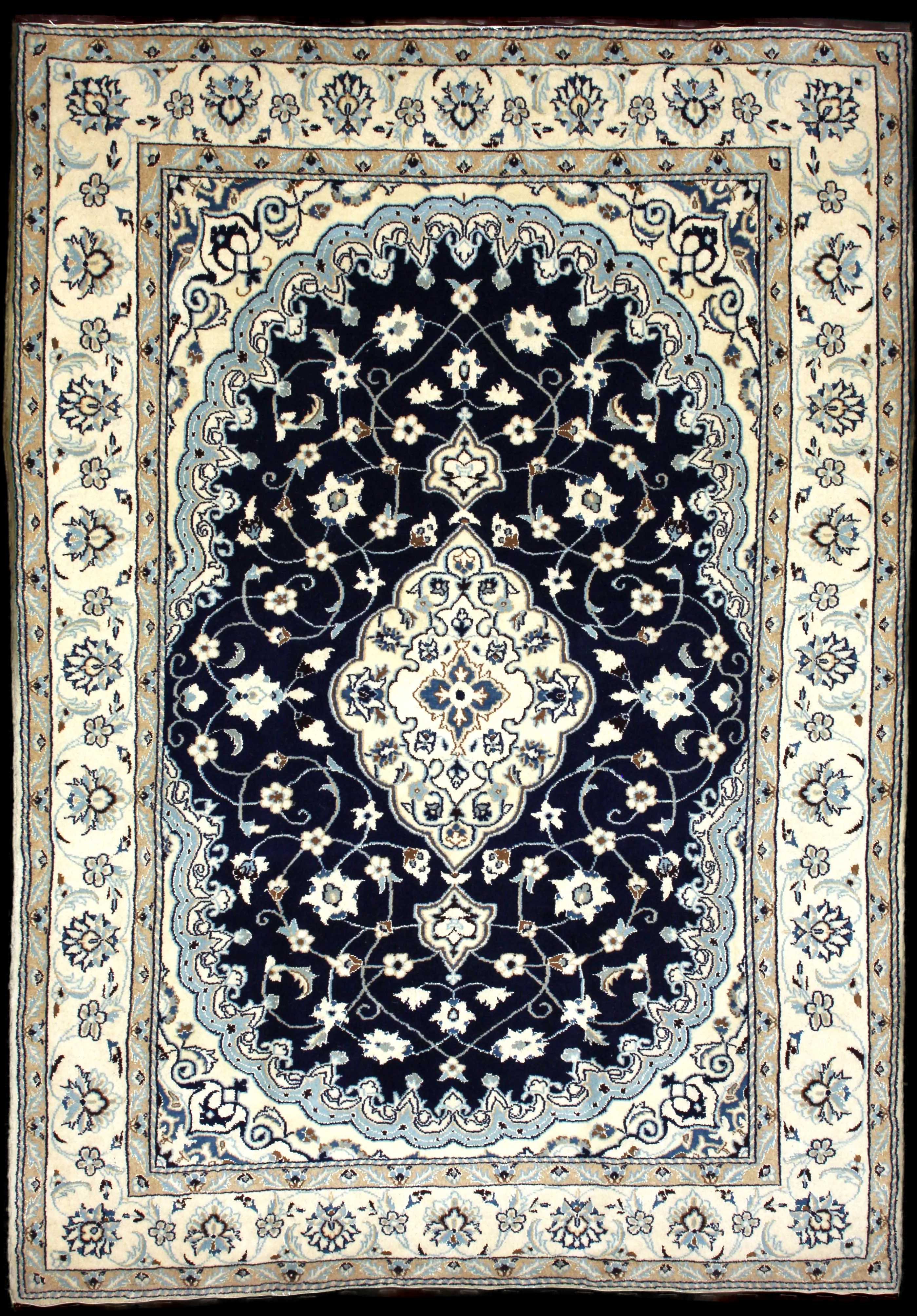 Handmade Persian rug of Nain style in dimensions 238 centimeters length by 160 centimetres width with mainly Beige and Blue colors