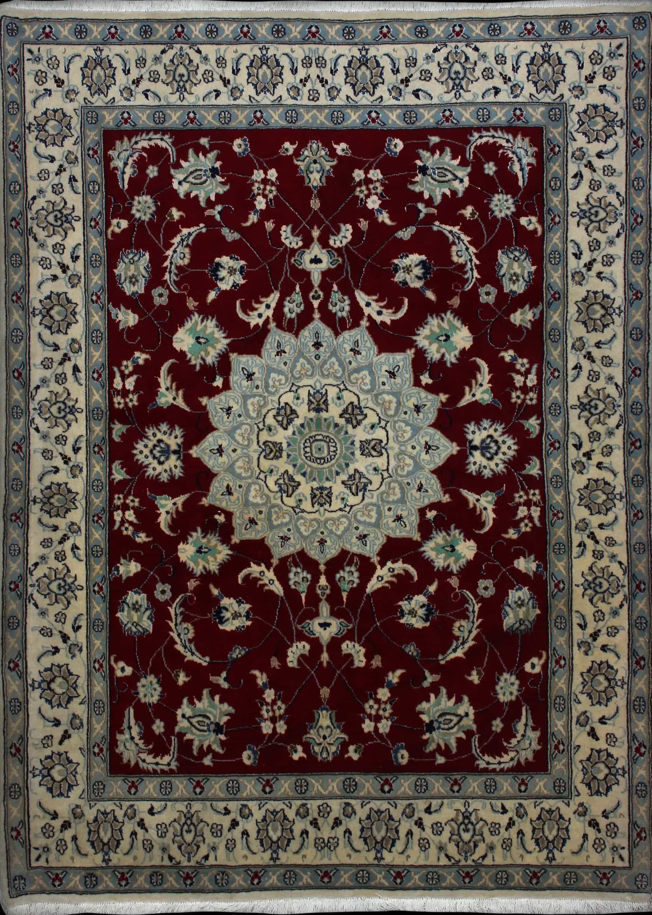 Handmade Perse rug in dimensions 208 centimeters length by 150 centimeters width with mainly Rouge colors