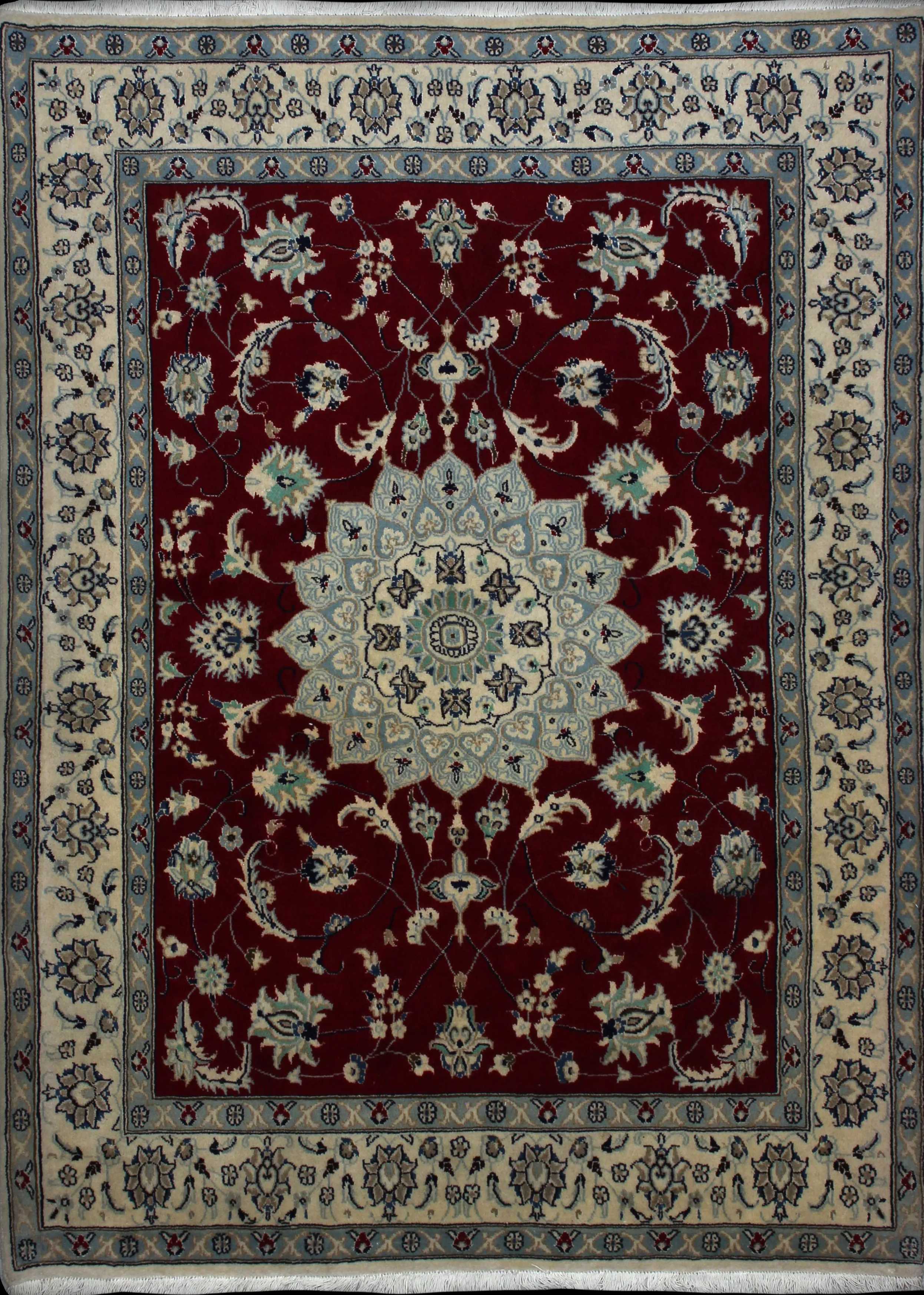 Handmade Persian rug of Nain style in dimensions 208 centimeters length by 150 centimetres width with mainly Red colors