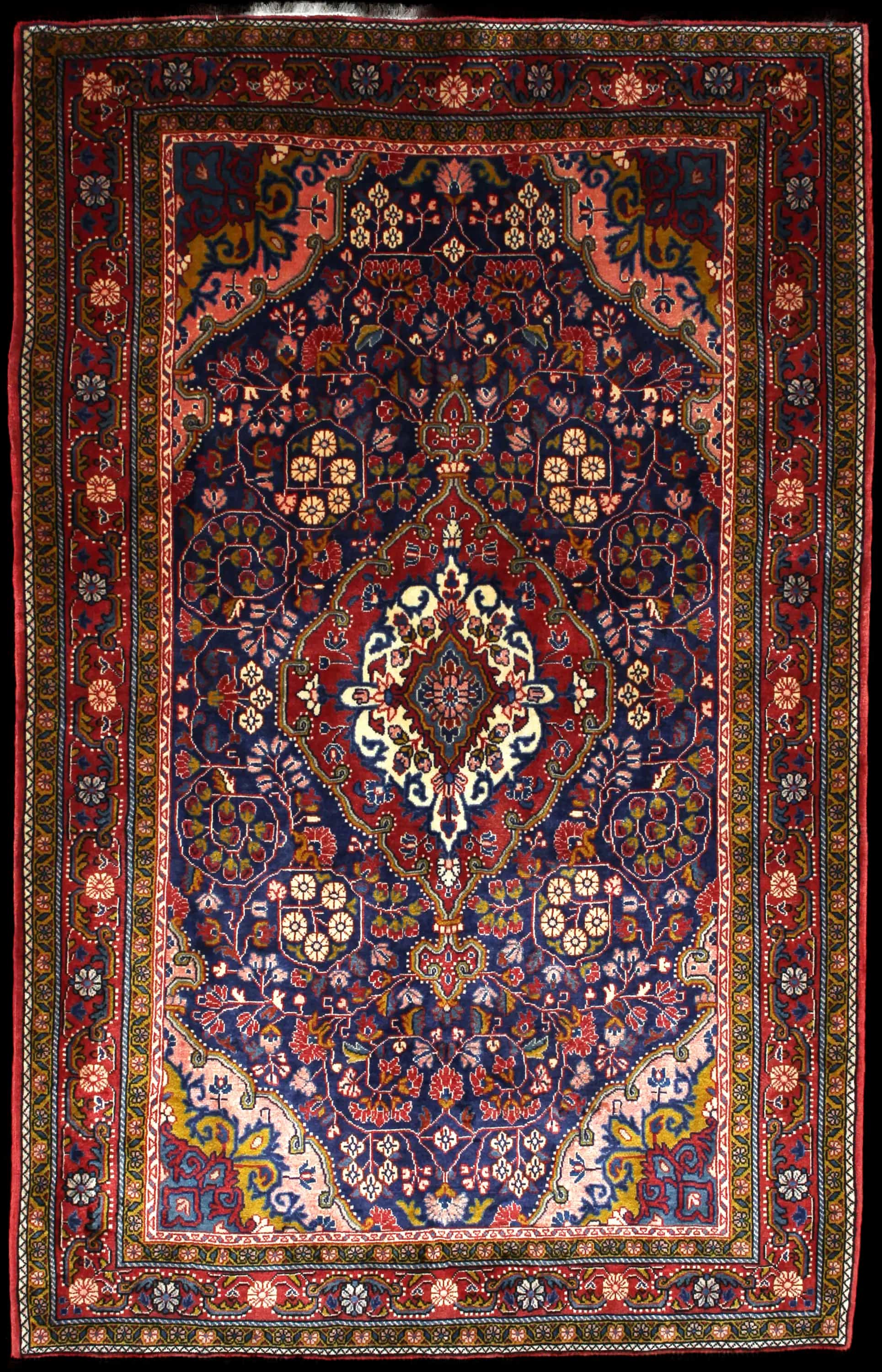 Handmade Perse rug in dimensions 209 centimeters length by 131 centimeters width with mainly Rouge et Bleu colors