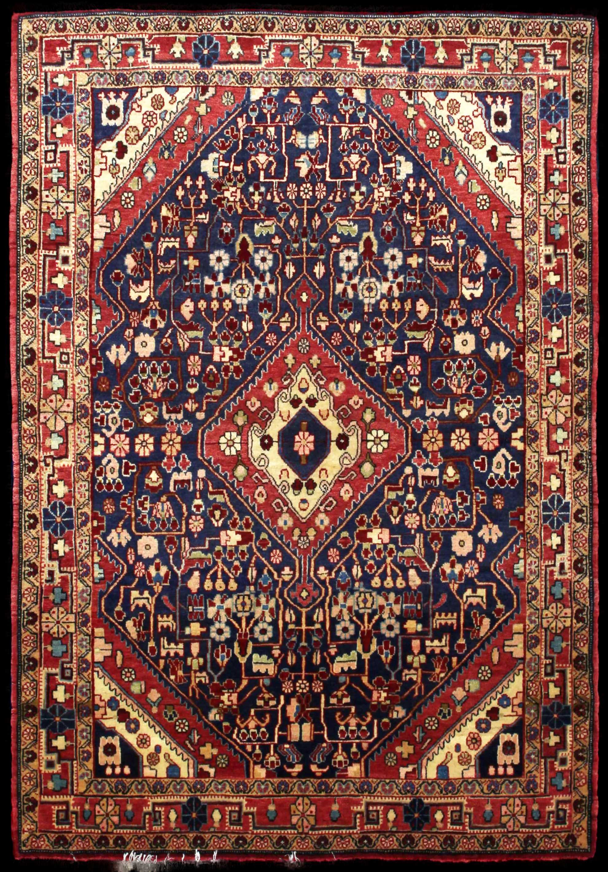 Handmade Persian rug in dimensions 163 centimeters length by 114 centimeters width with mainly Red and Blue colors