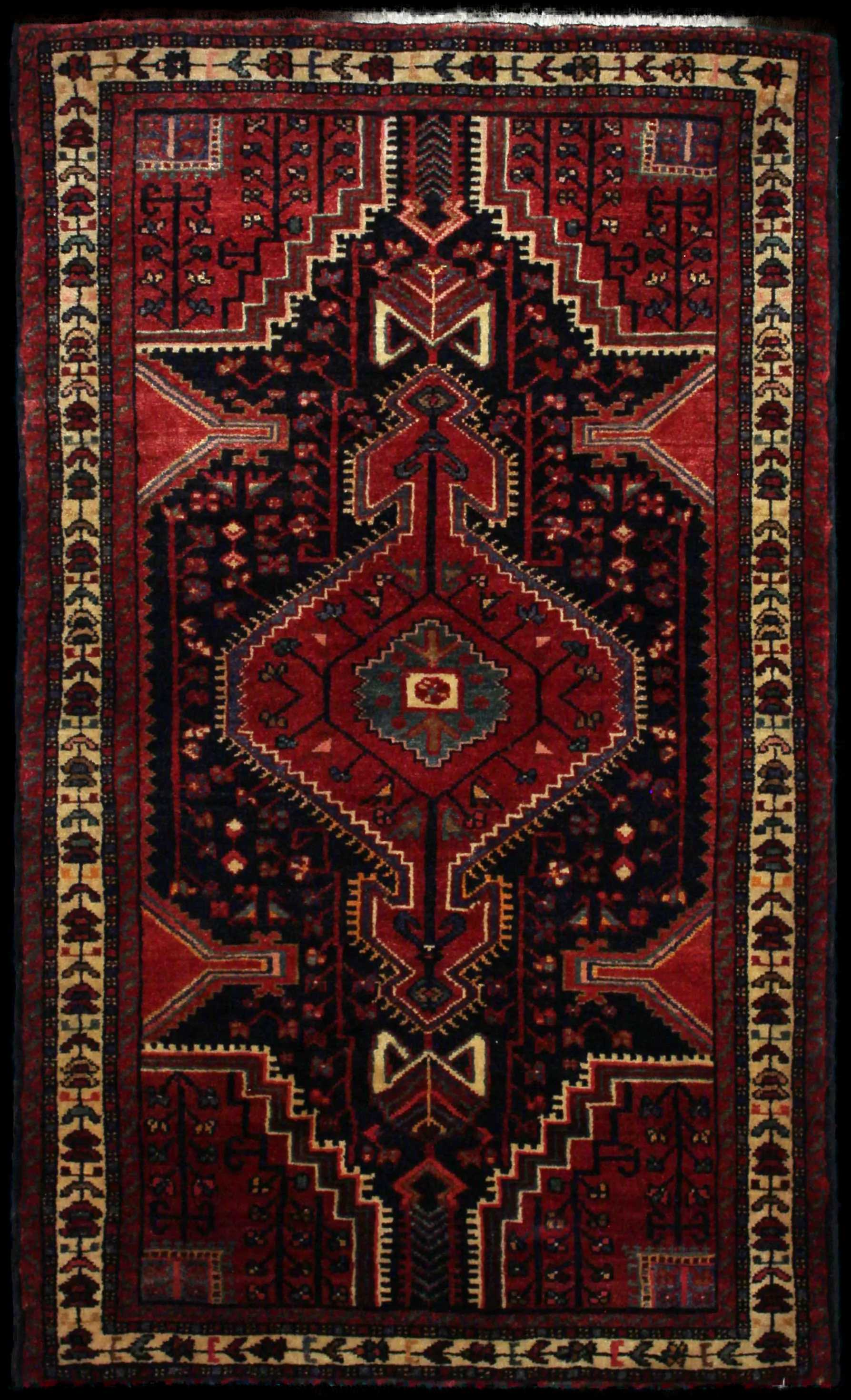 Handmade Perse rug in dimensions 170 centimeters length by 103 centimeters width with mainly Rouge et Bleu colors