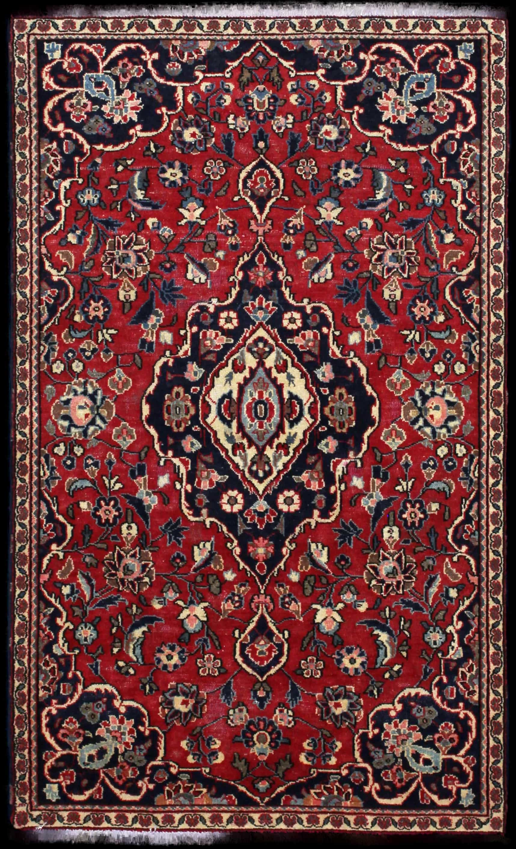 Handmade Perse rug in dimensions 160 centimeters length by 100 centimeters width with mainly Rouge colors