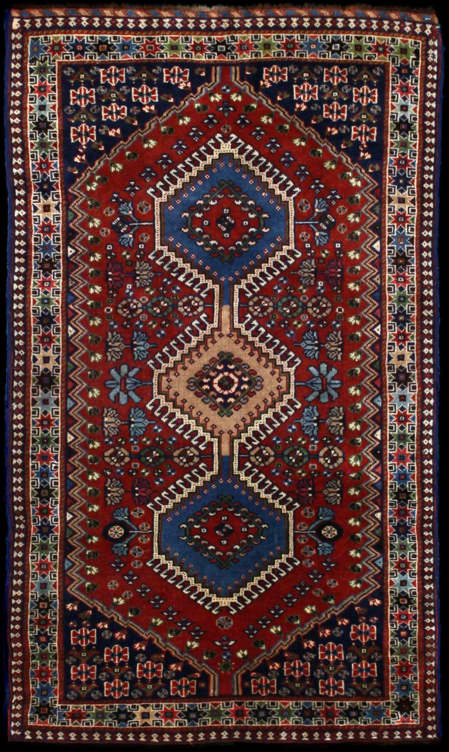 Handmade Perse rug in dimensions 148 centimeters length by 85 centimeters width with mainly Bleu et Orange colors