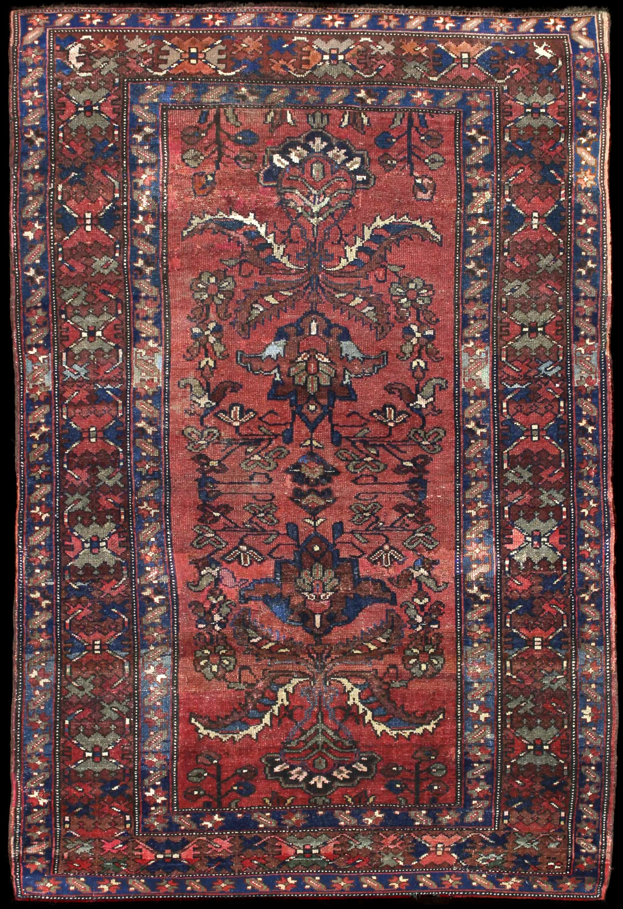 Handmade Perse rug in dimensions 200 centimeters length by 137 centimeters width with mainly Rouge colors