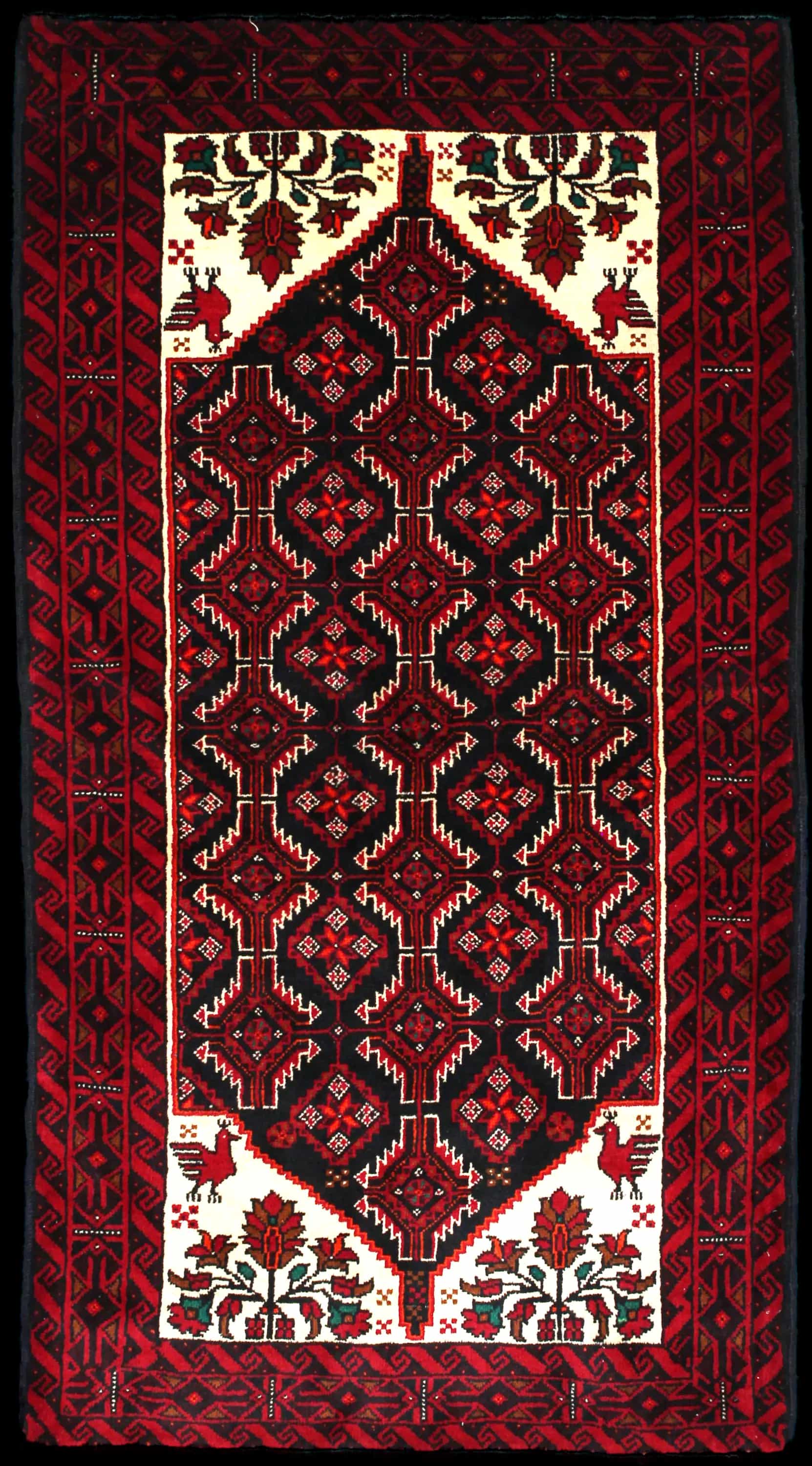 Handmade Perse rug in dimensions 194 centimeters length by 105 centimeters width with mainly Rouge et Noir colors