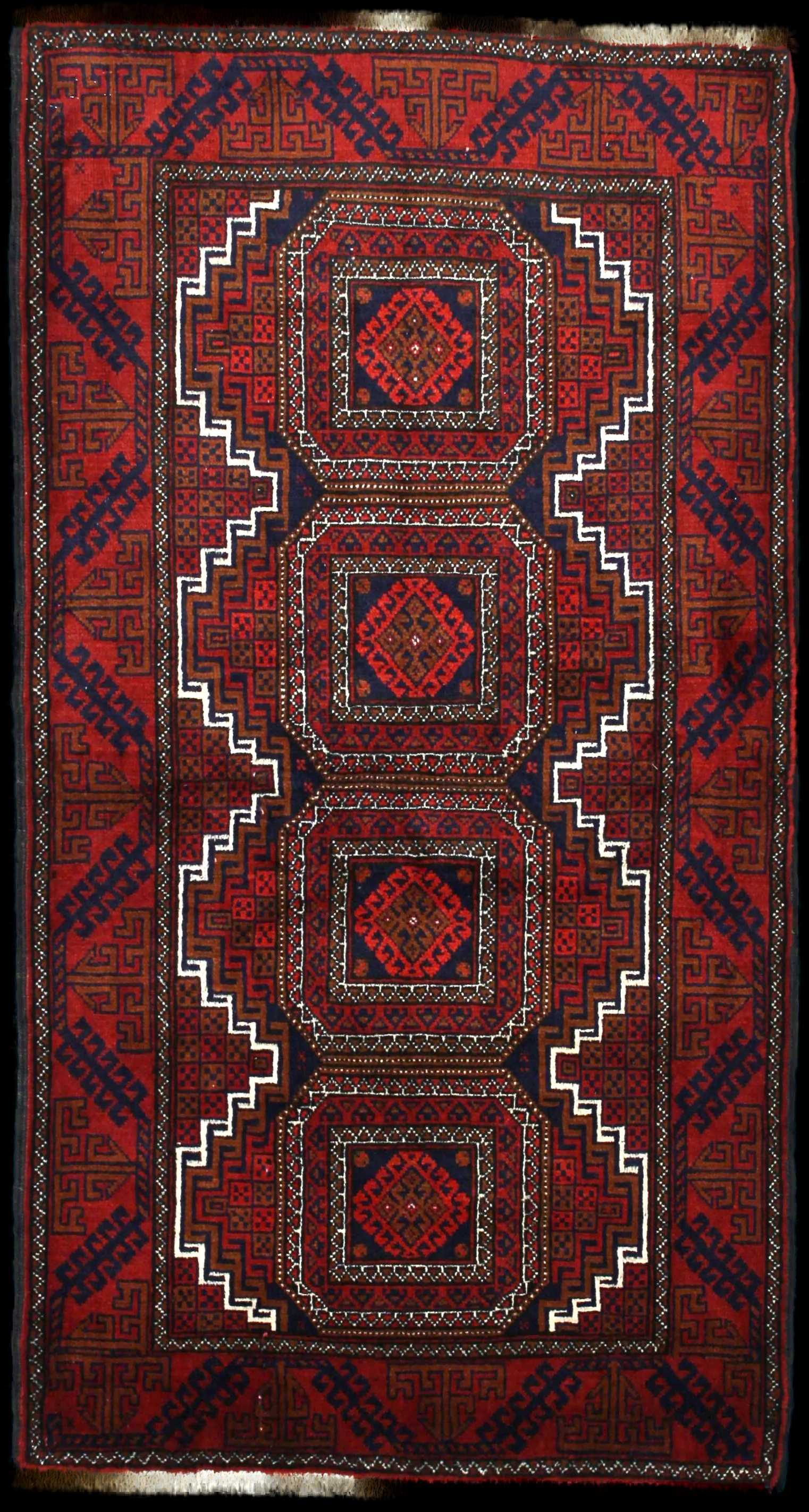 Handmade Persian rug of Turkoman style in dimensions 162 centimeters length by 87 centimetres width with mainly Red colors