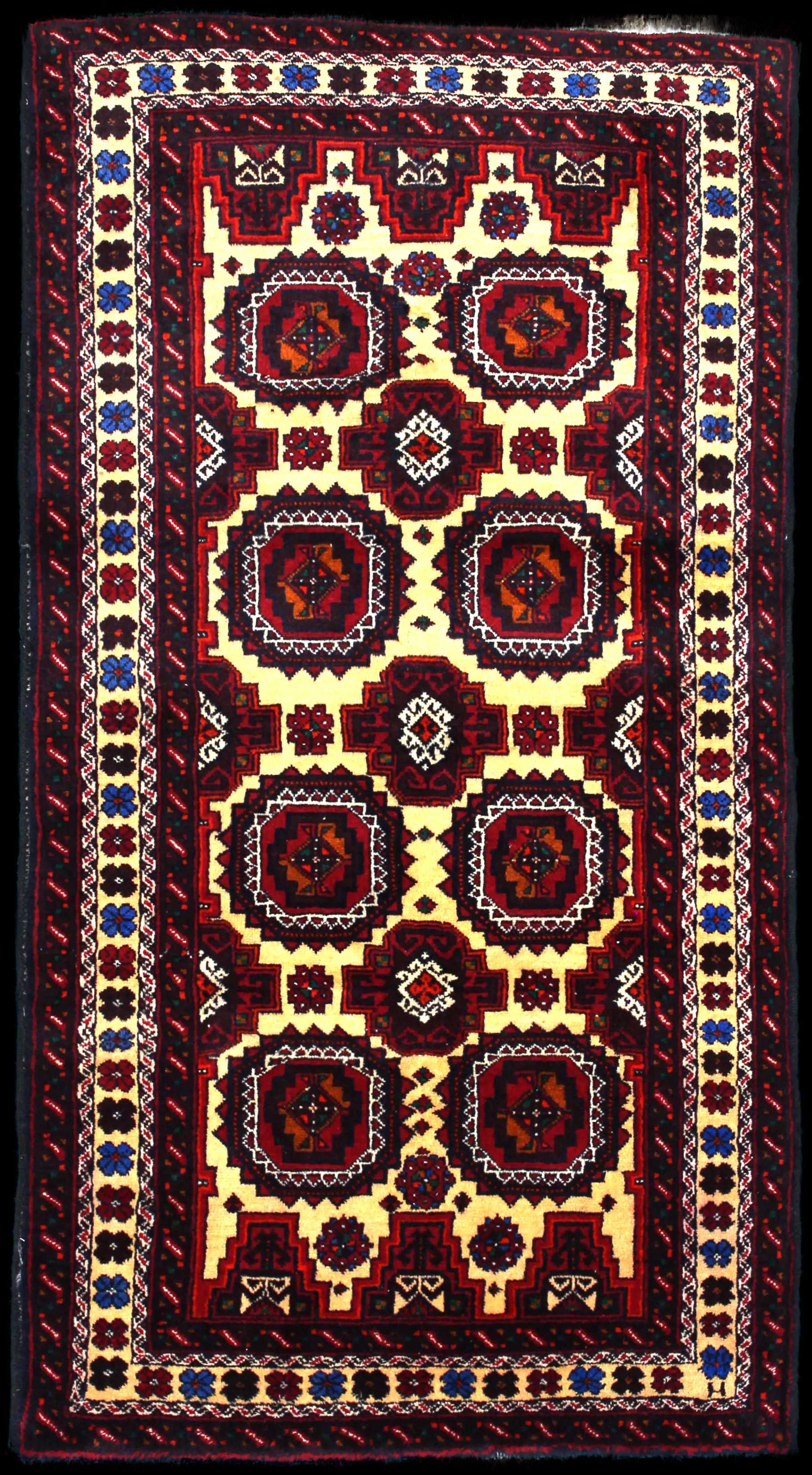 Handmade Persian rug of Baluch style in dimensions 193 centimeters length by 100 centimetres width with mainly Red and Orange colors