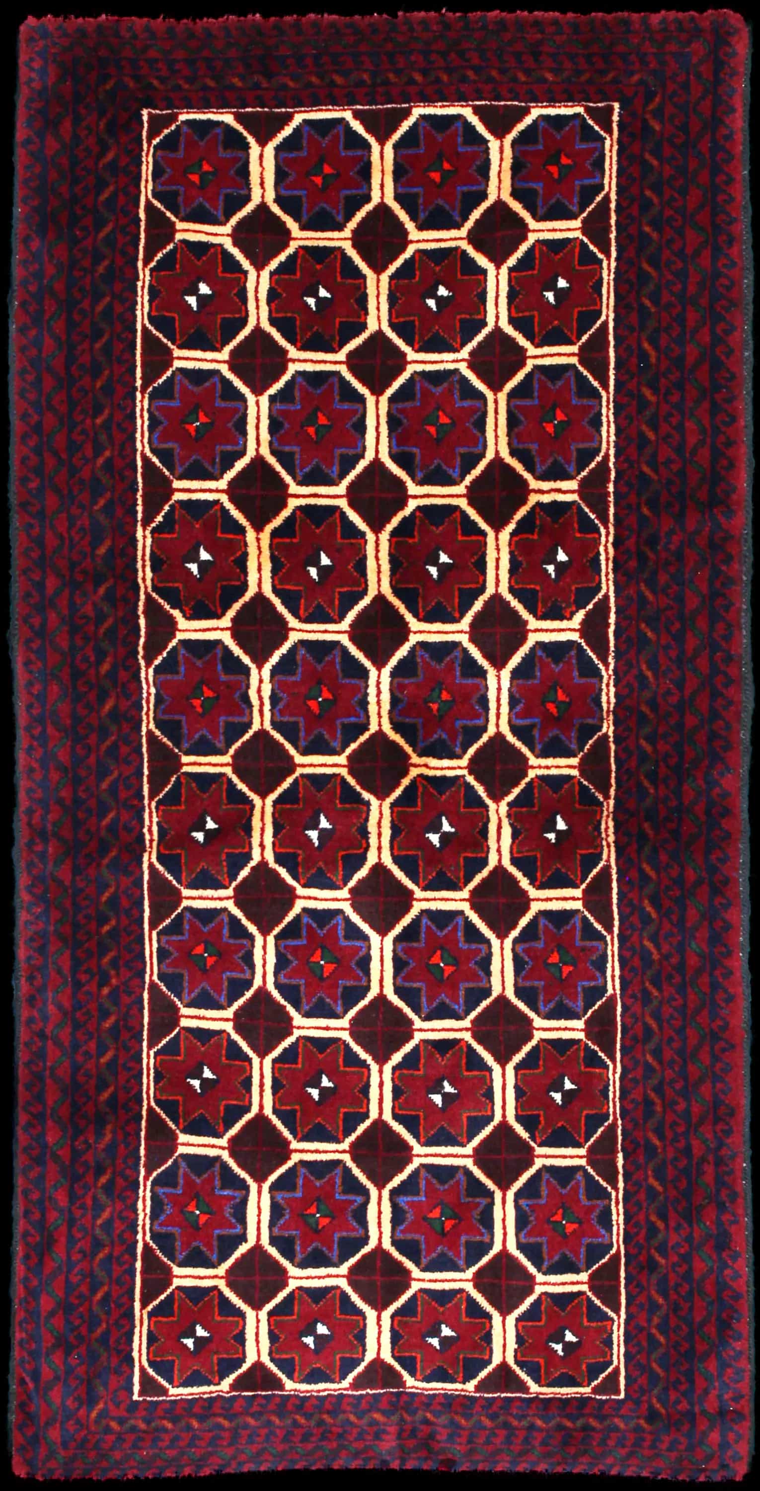 Handmade Perse rug in dimensions 190 centimeters length by 95 centimeters width with mainly Rouge et Bleu colors