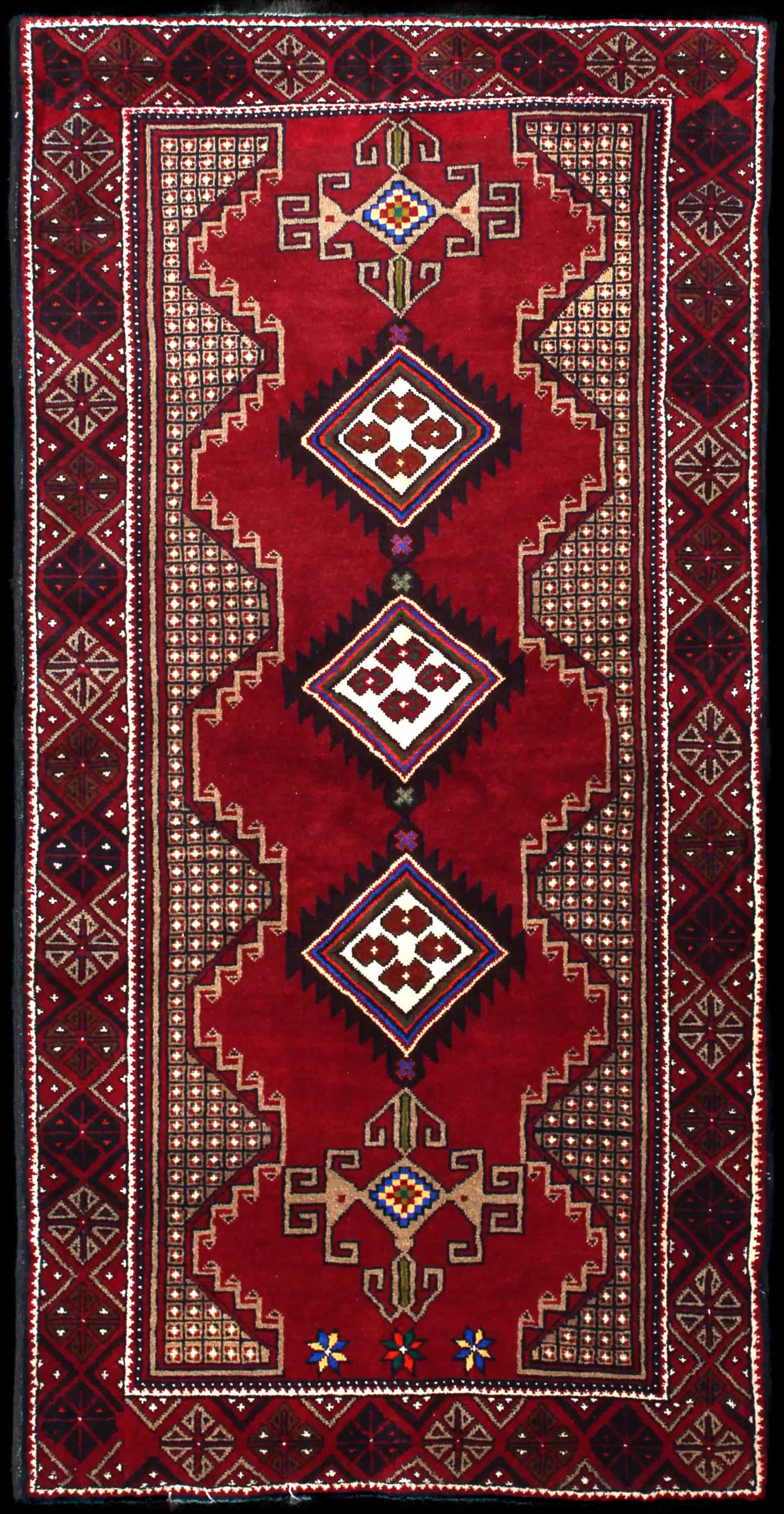 Handmade Persian rug in dimensions 195 centimeters length by 100 centimeters width with mainly Red colors