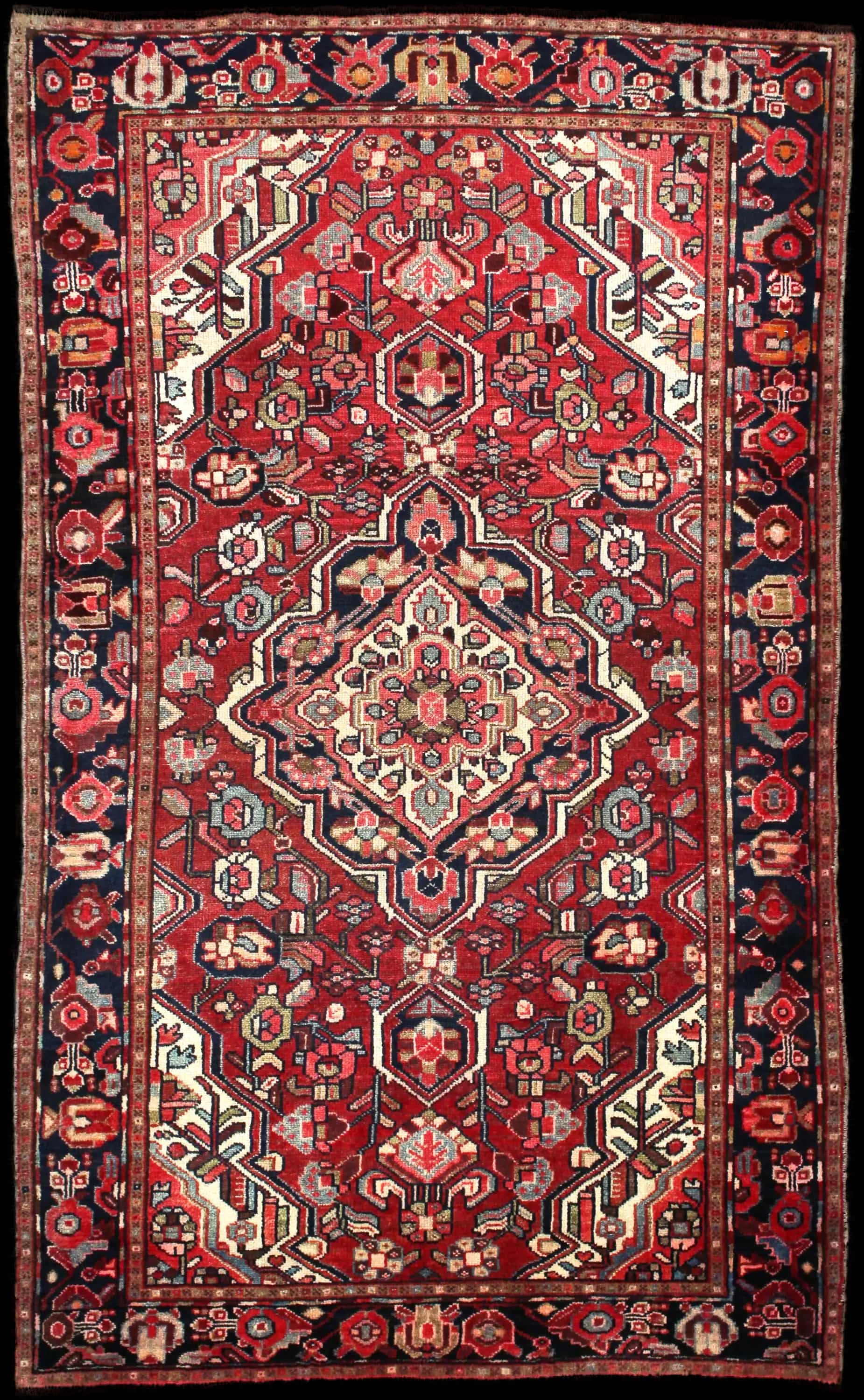 Handmade Perse rug in dimensions 202 centimeters length by 123 centimeters width with mainly Rouge colors