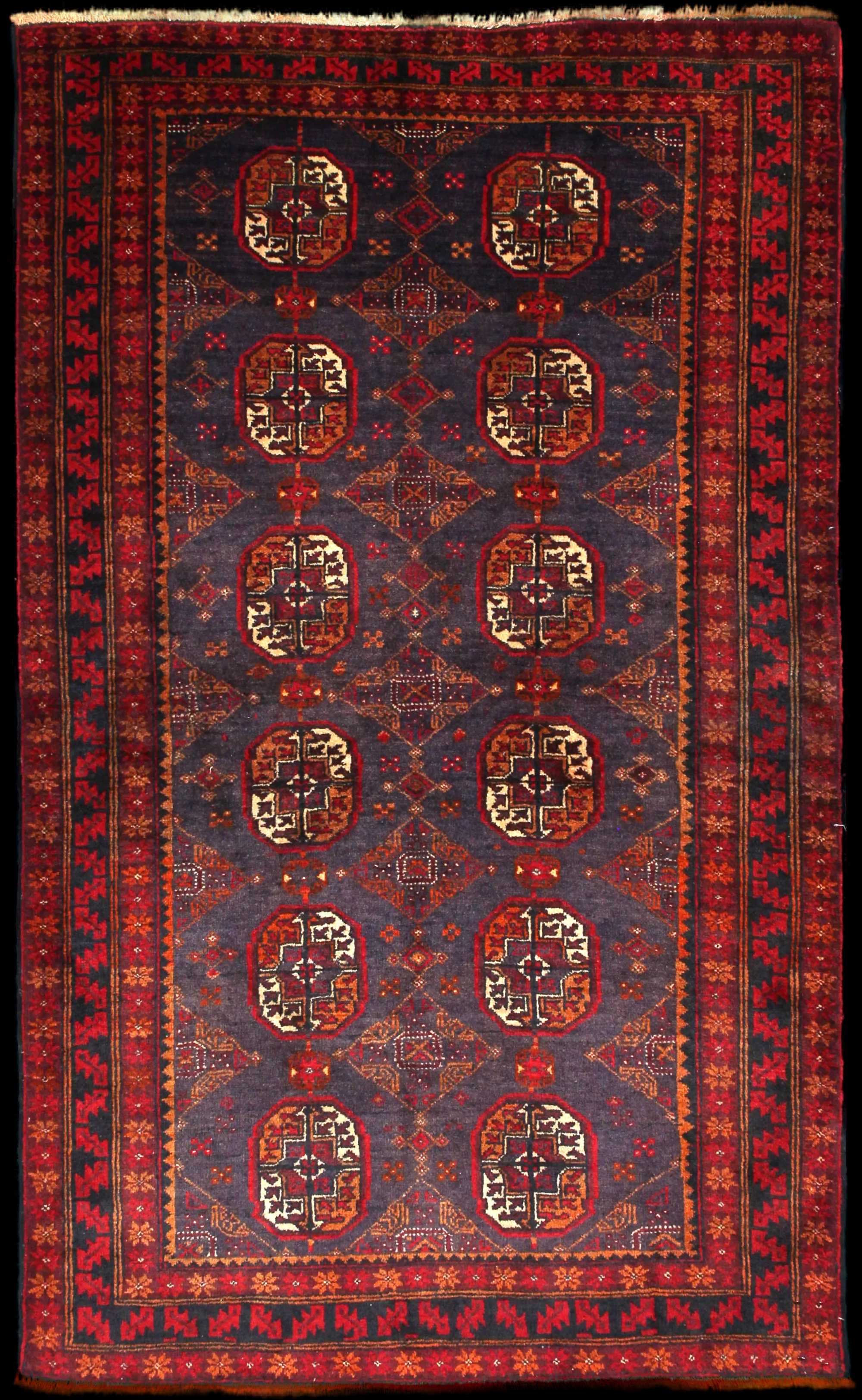 Handmade Persian rug of Baluch style in dimensions 188 centimeters length by 116 centimetres width with mainly Red colors