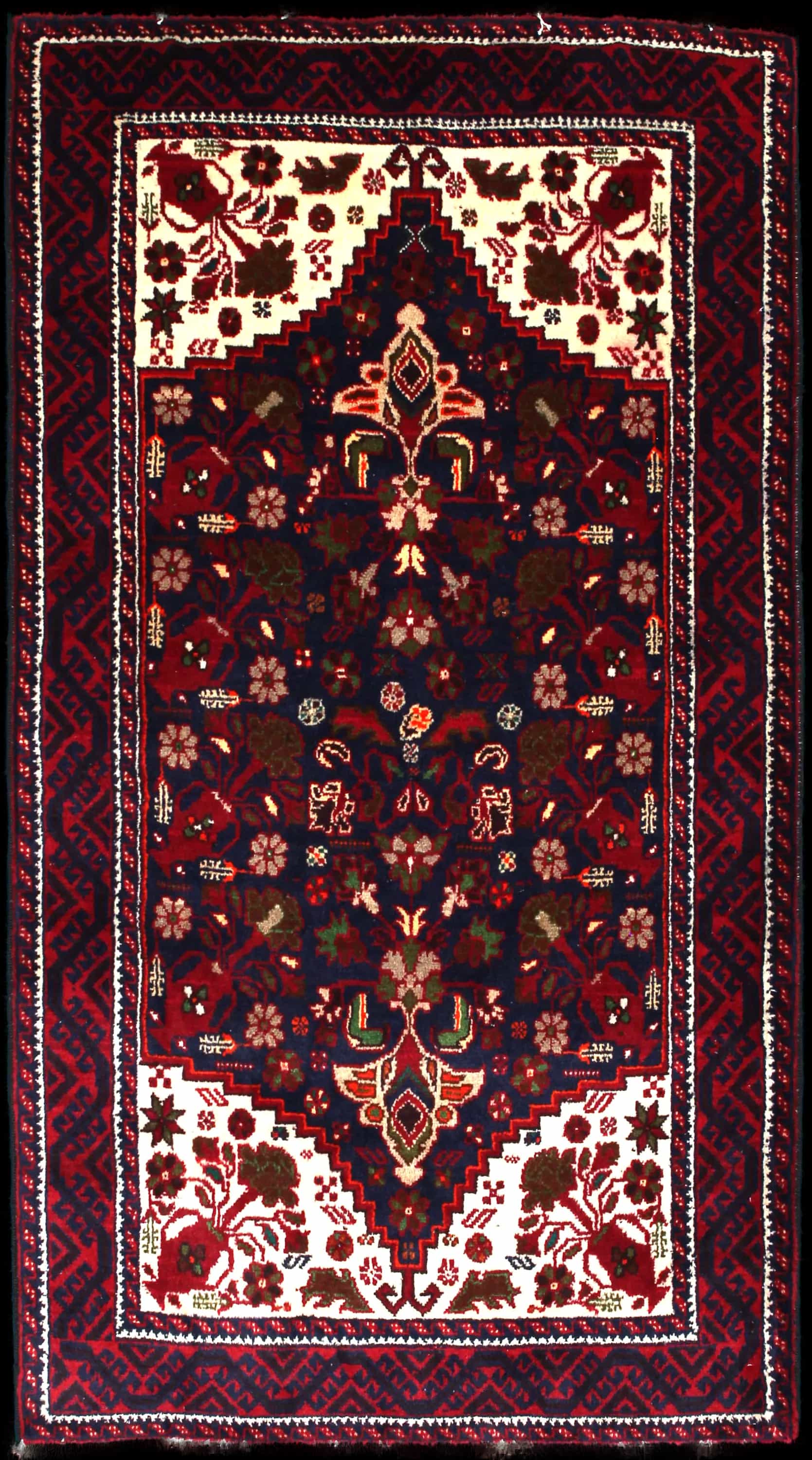 Handmade Persian rug in dimensions 190 centimeters length by 104 centimeters width with mainly Red colors