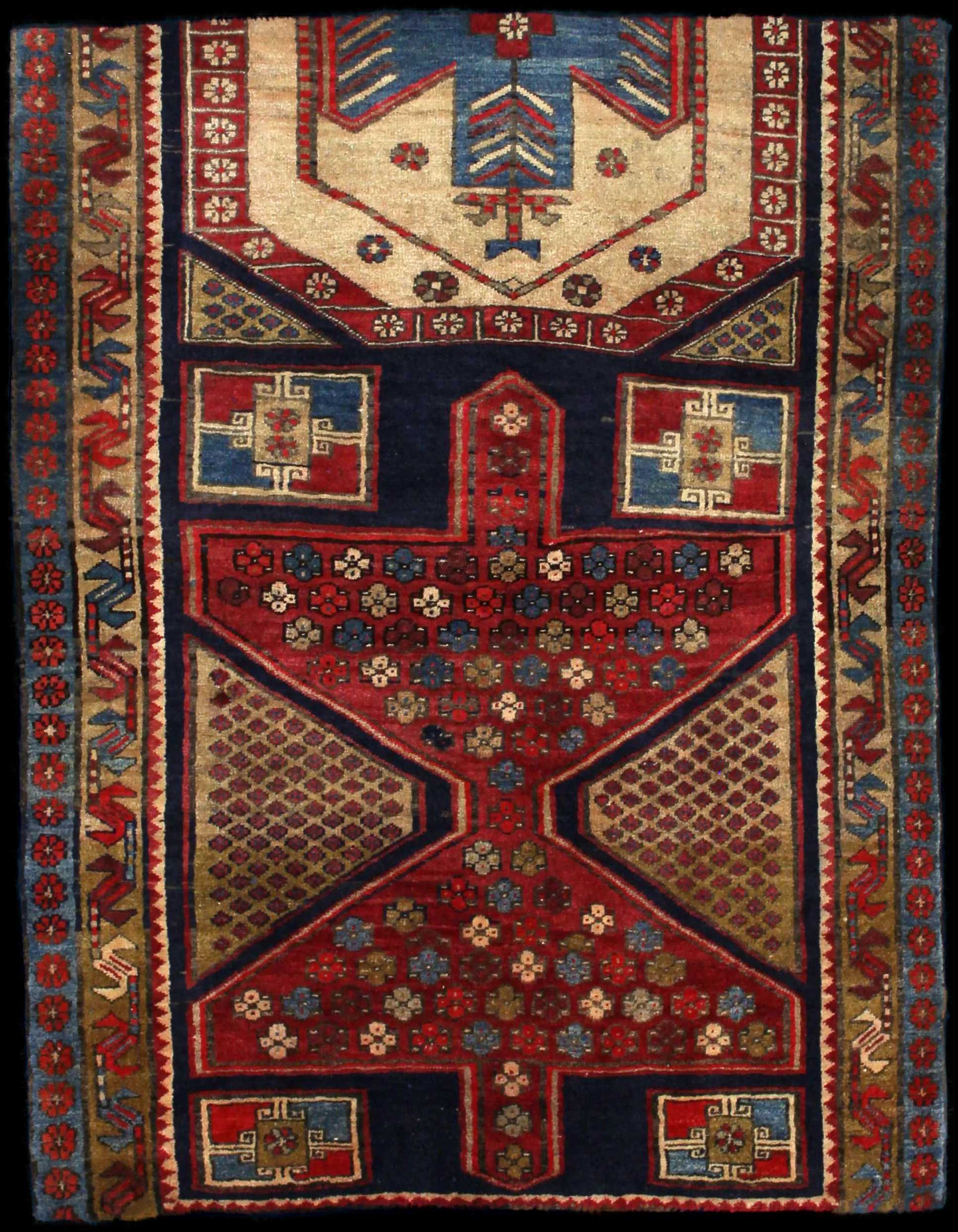 Handmade Persian rug in dimensions 143 centimeters length by 111 centimetres width with mainly Red and Blue colors