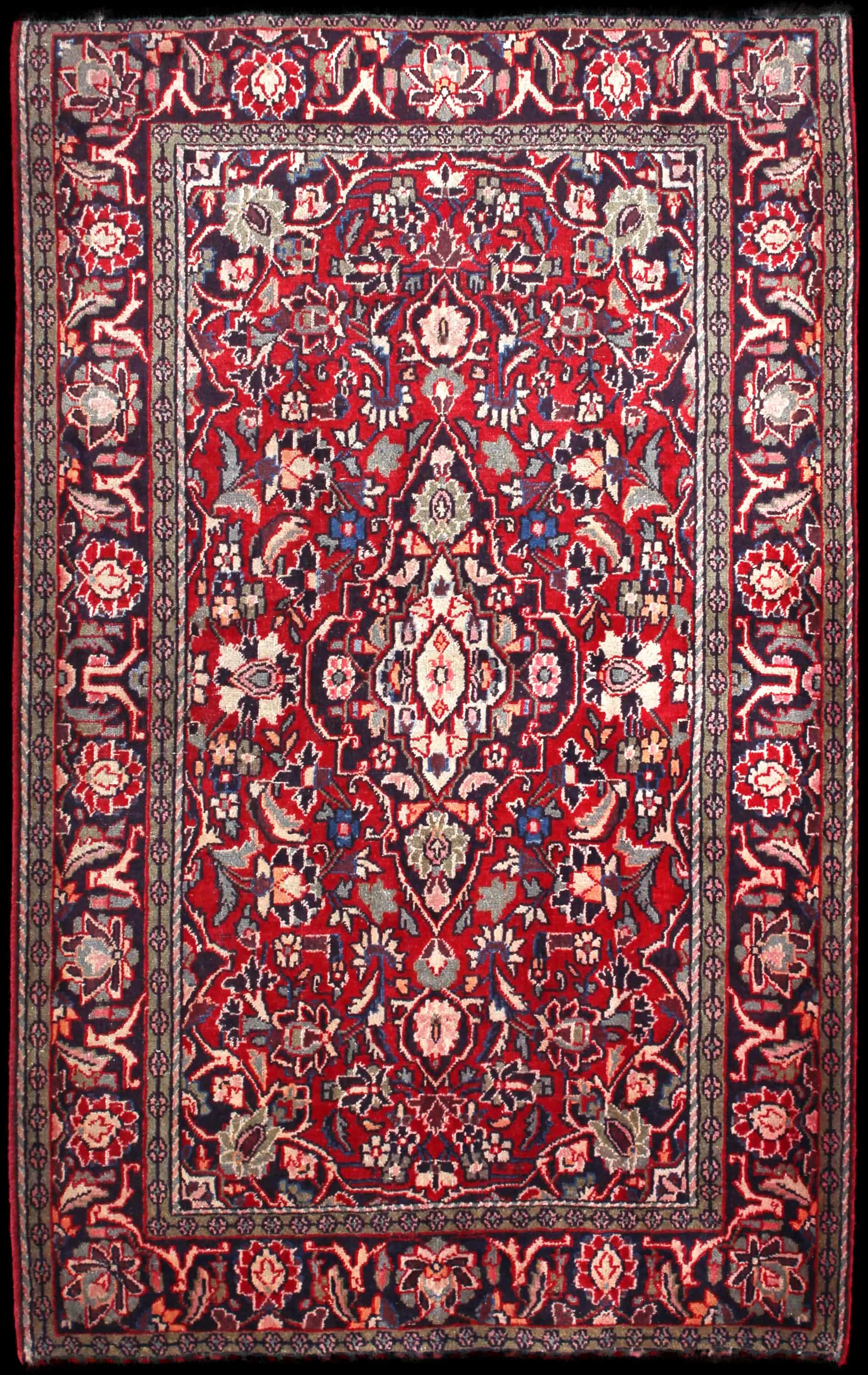 Handmade Persian rug in dimensions 200 centimeters length by 125 centimeters width with mainly Red and Green colors