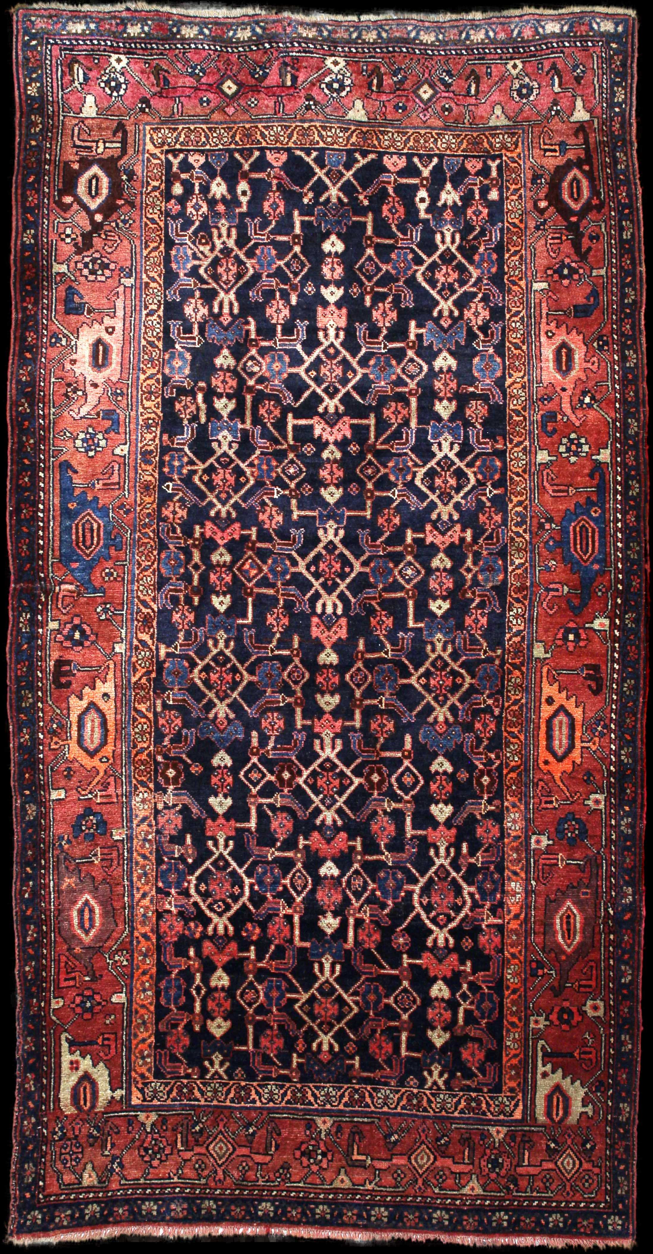 Handmade Persian rug in dimensions 244 centimeters length by 130 centimetres width with mainly Blue and Brown colors