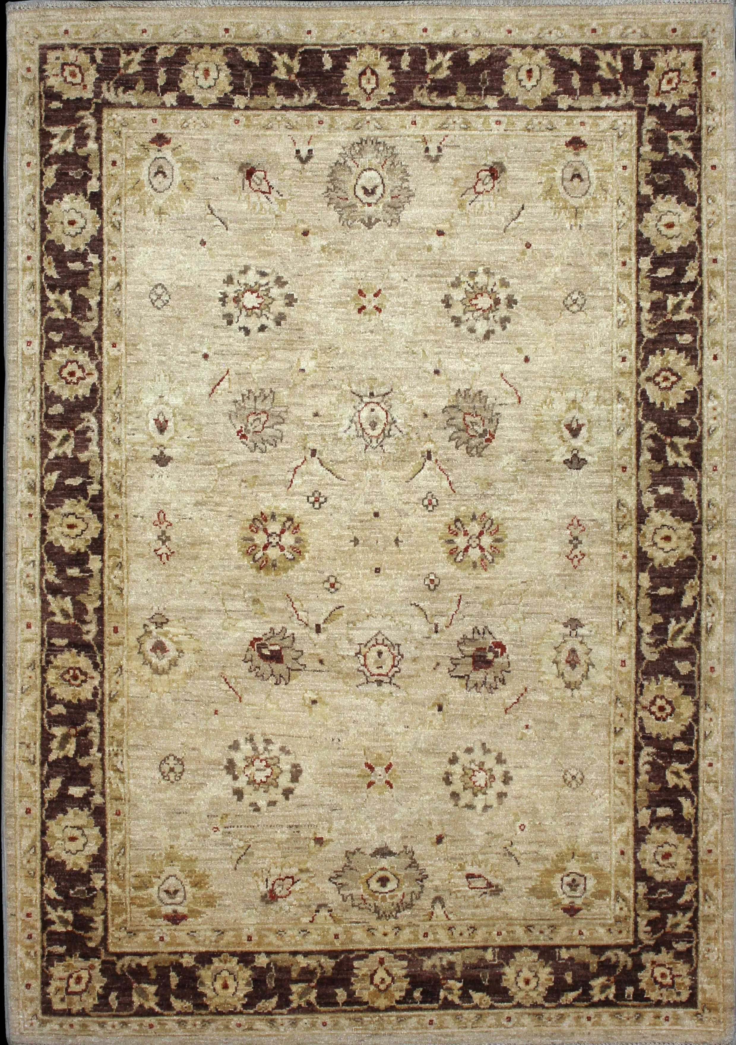 Handmade Pakistan rug in dimensions 205 centimeters length by 144 centimetres width with mainly Yellow and Brown colors