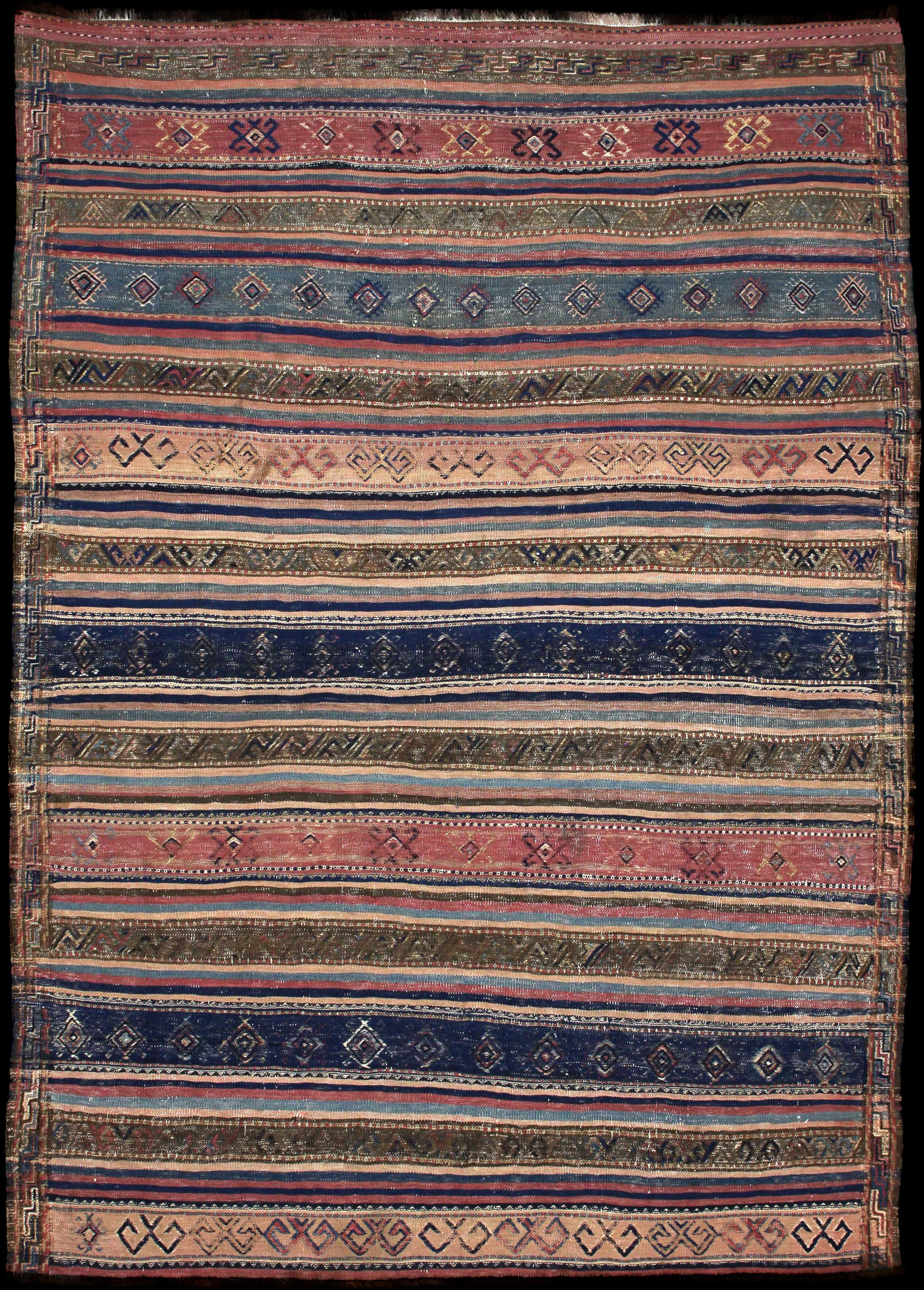 Handmade Persian rug of Sumak style in dimensions 245 centimeters length by 177 centimetres width with mainly Blue and Brown colors