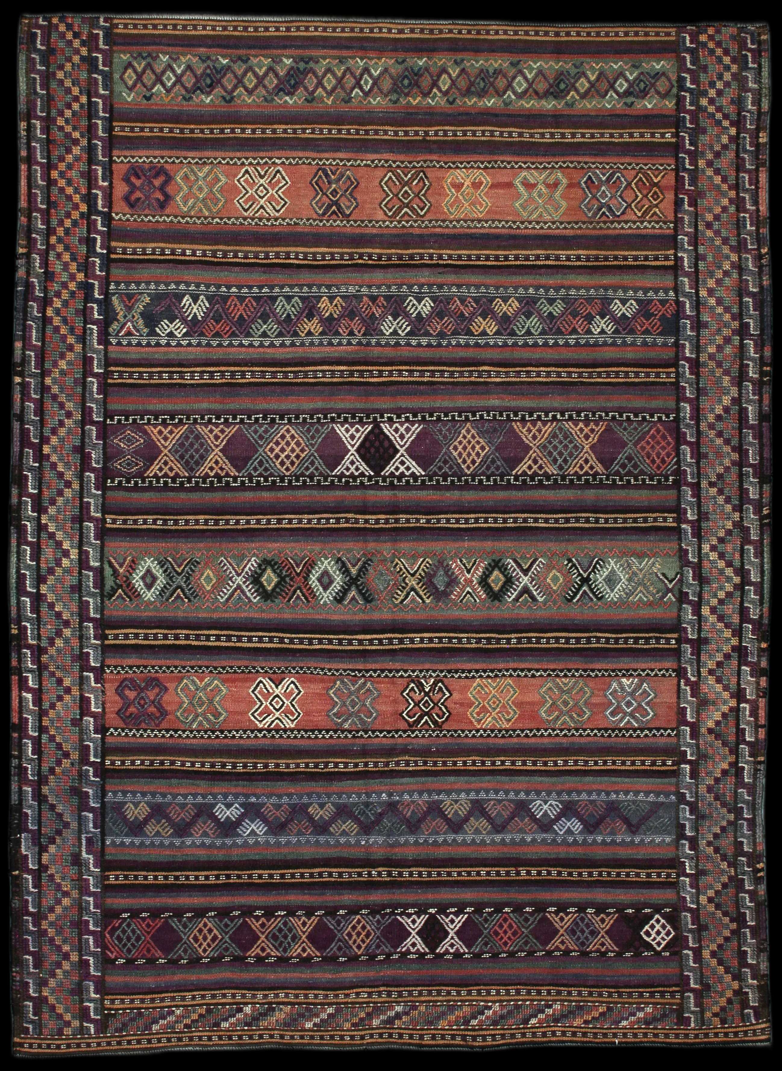 Handmade Persian rug of Sumak style in dimensions 205 centimeters length by 151 centimetres width with mainly Purple and Brown colors