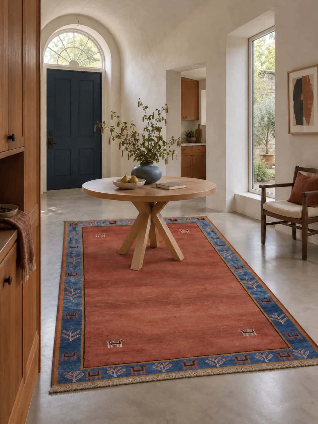 Persian Gabbeh rug, 175x275 cm, mainly red — In a room