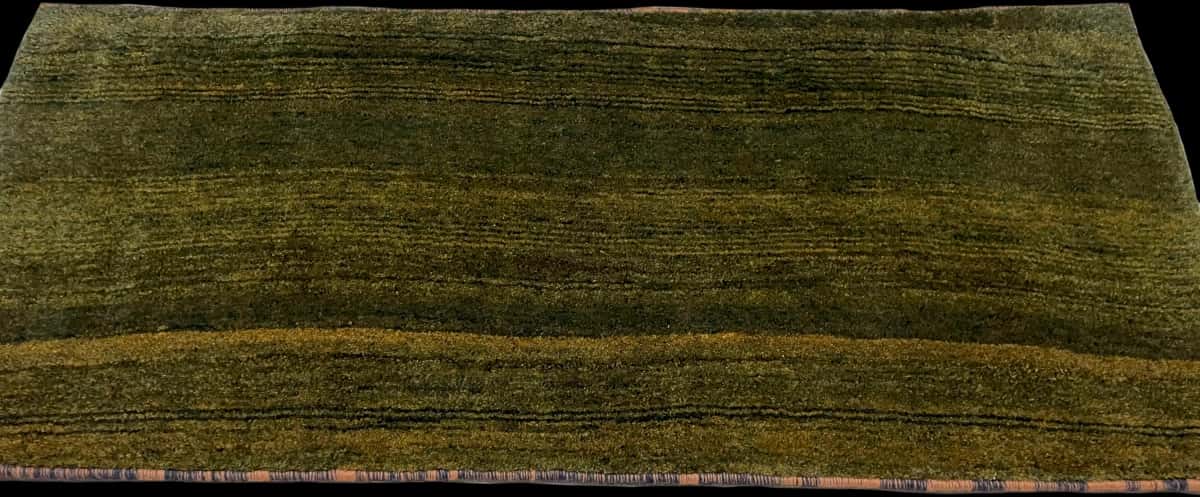 Persian rug of Gabbeh style in dimensions 165 centimeters length by 75 centimeters width with mainly green colors — Perspective
