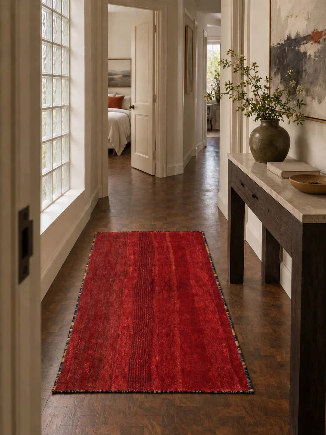 Persian Gabbeh rug, plain, 85x156 cm, mainly red — In a room