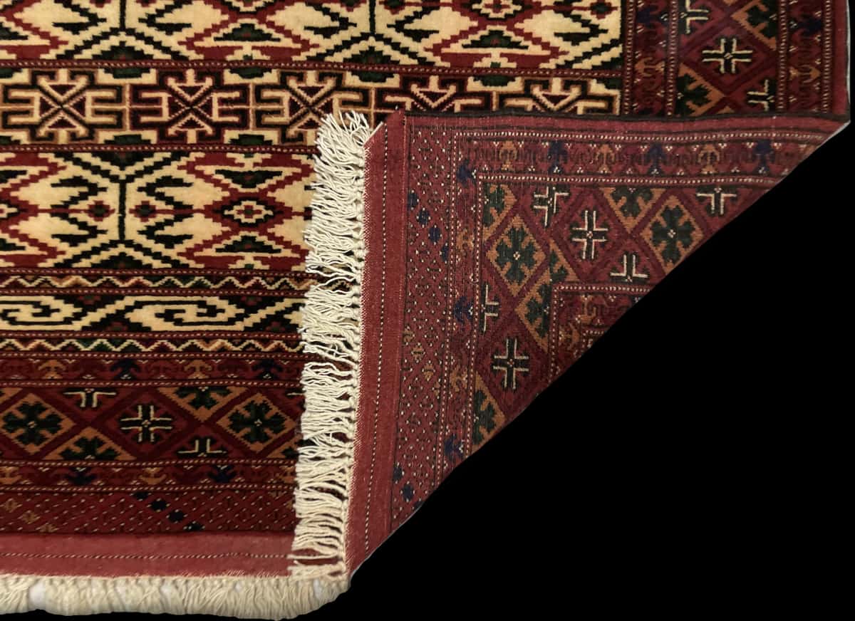 Persian rug of Turkoman style in dimensions 172 centimeters length by 114 centimeters width with mainly beige colors — Folded
