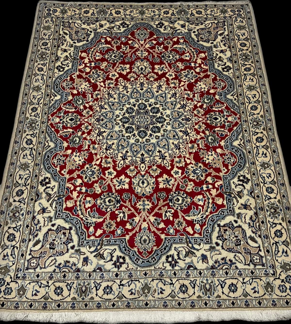 Persian rug of Nain style in dimensions 196 centimeters length by 148 centimeters width with mainly red colors — Perspective
