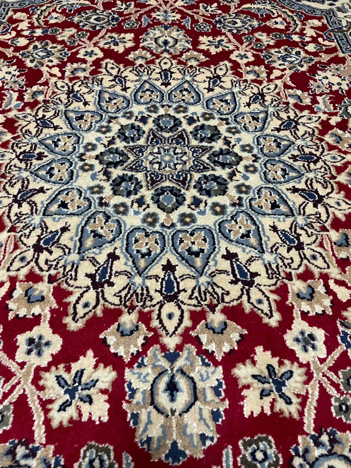 Persian rug of Nain style in dimensions 196 centimeters length by 148 centimeters width with mainly red colors — Perspective