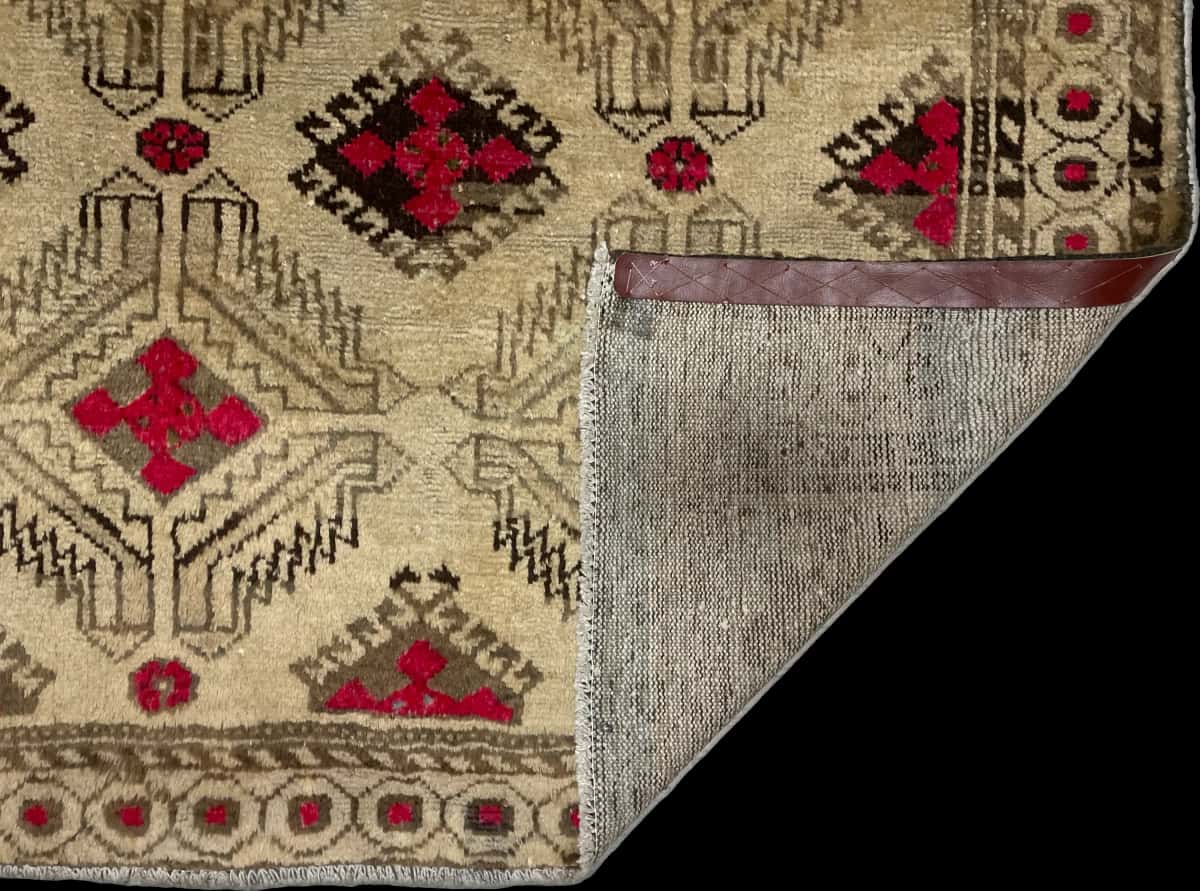 Persian rug of Baluch style in dimensions 214 centimeters length by 125 centimeters width with mainly yellow and brown colors — Folded