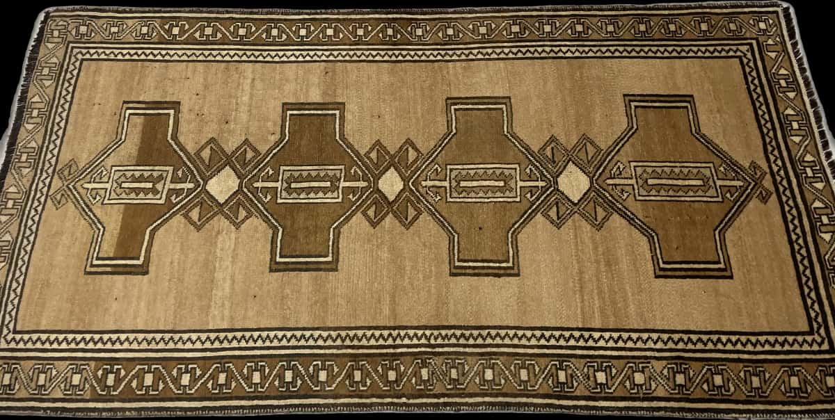 Persian rug of Baluch style in dimensions 220 centimeters length by 120 centimeters width with mainly brown colors — Perspective