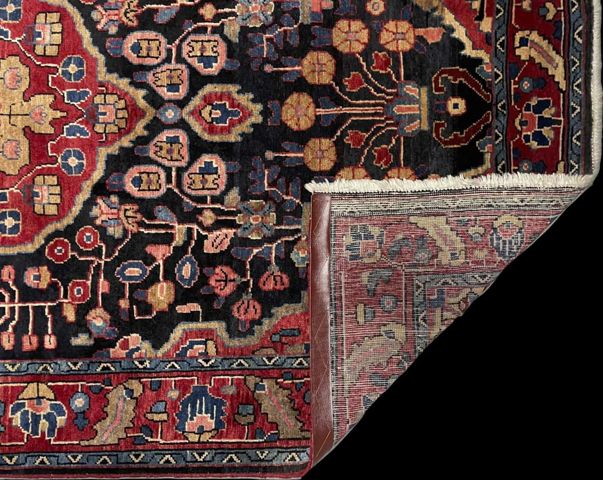 Persian rug of Mahallat style in dimensions 224 centimeters length by 130 centimeters width with mainly red and blue colors — Folded