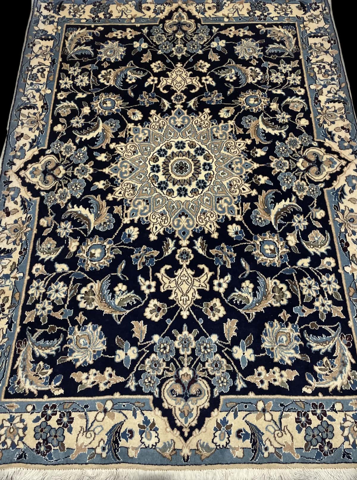 Persian rug of Nain style in dimensions 198 centimeters length by 142 centimeters width with mainly blue colors — Perspective