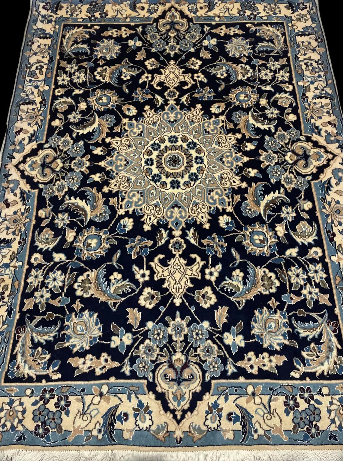 Persian rug of Nain style in dimensions 198 centimeters length by 142 centimeters width with mainly blue colors — Perspective